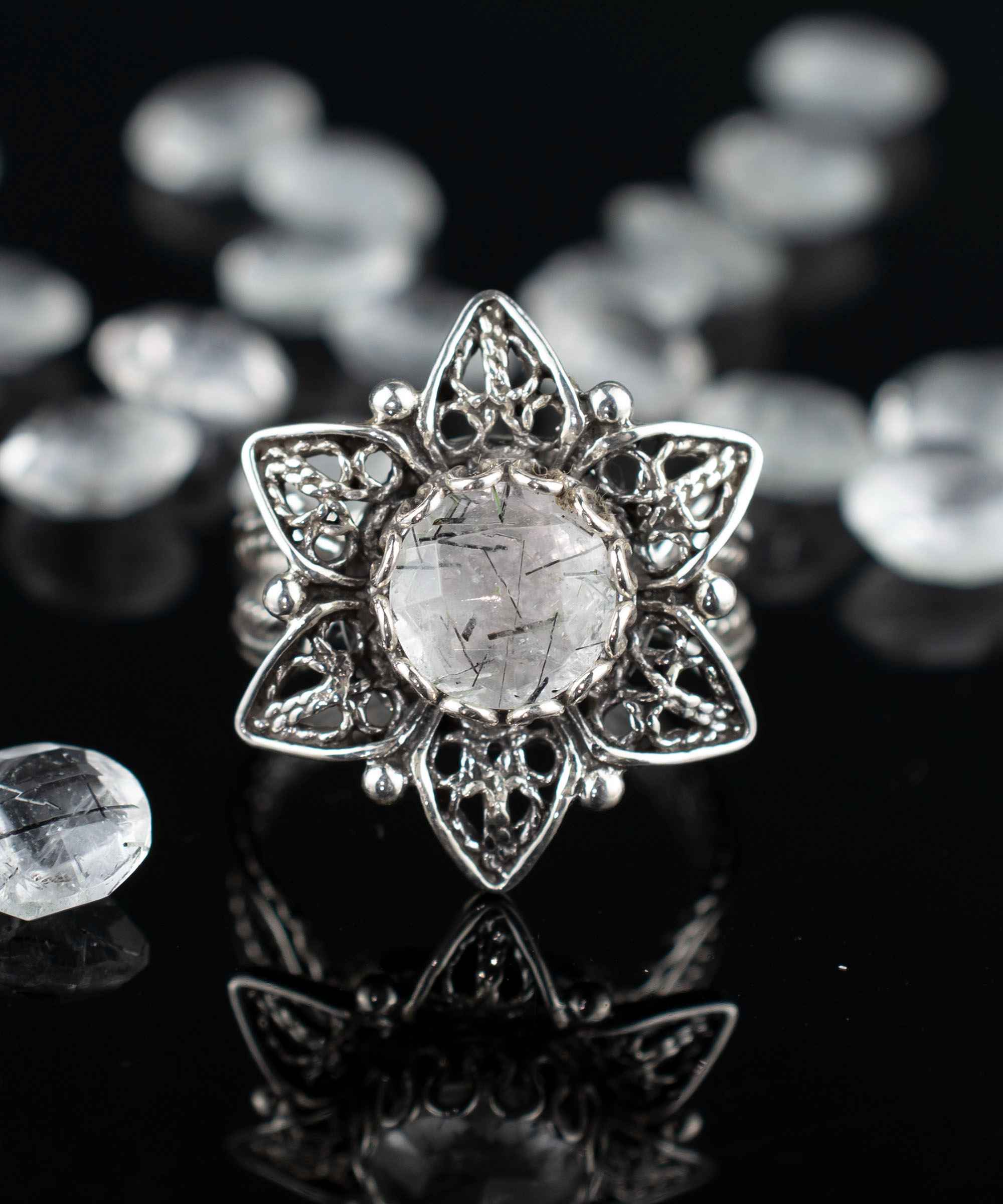 Elegant Filigree Art Black Rutile Gemstone Daisy Flower Cocktail Ring in sterling silver, showcasing intricate design and a round-cut gemstone.