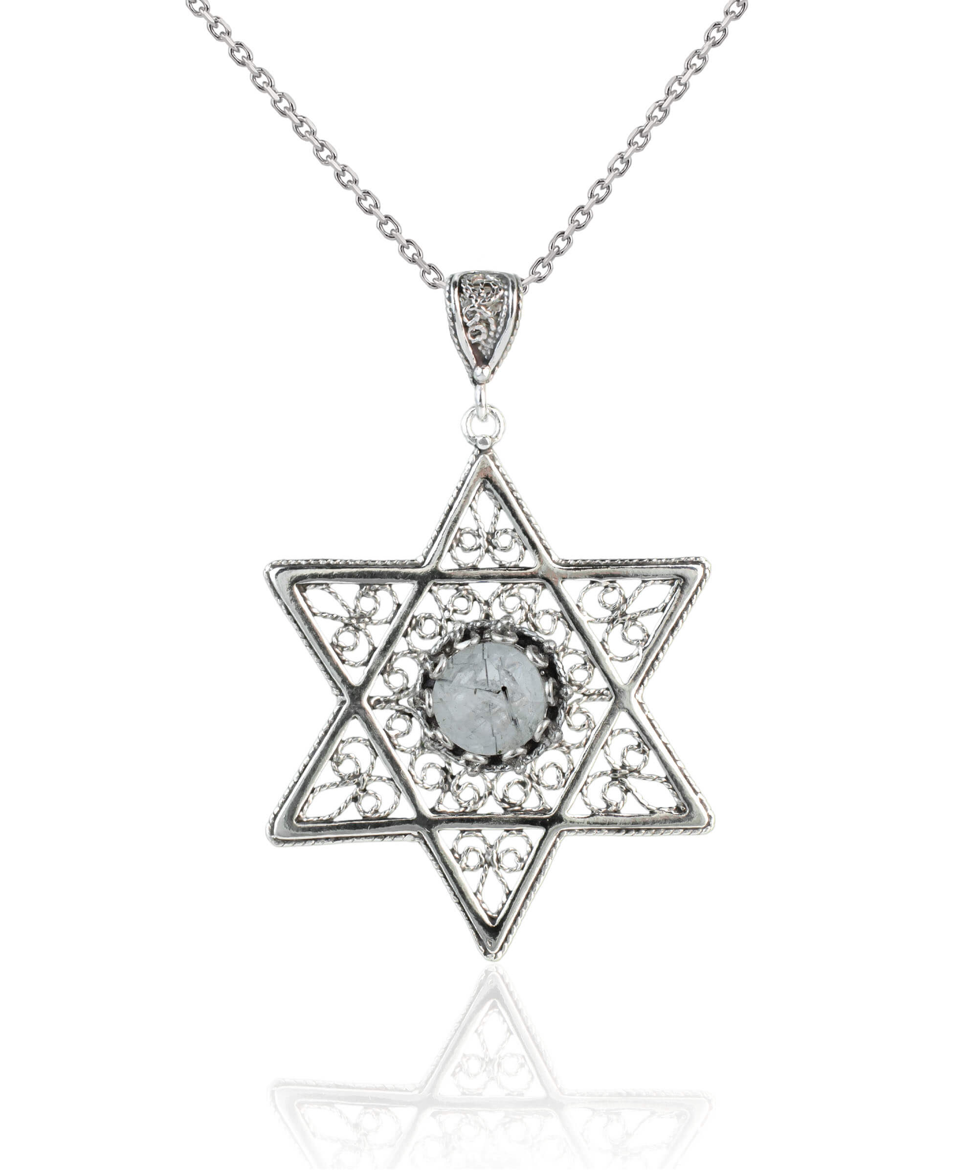 Handcrafted silver pendant featuring a black rutile gemstone in the shape of the Star of David, showcasing intricate filigree art.