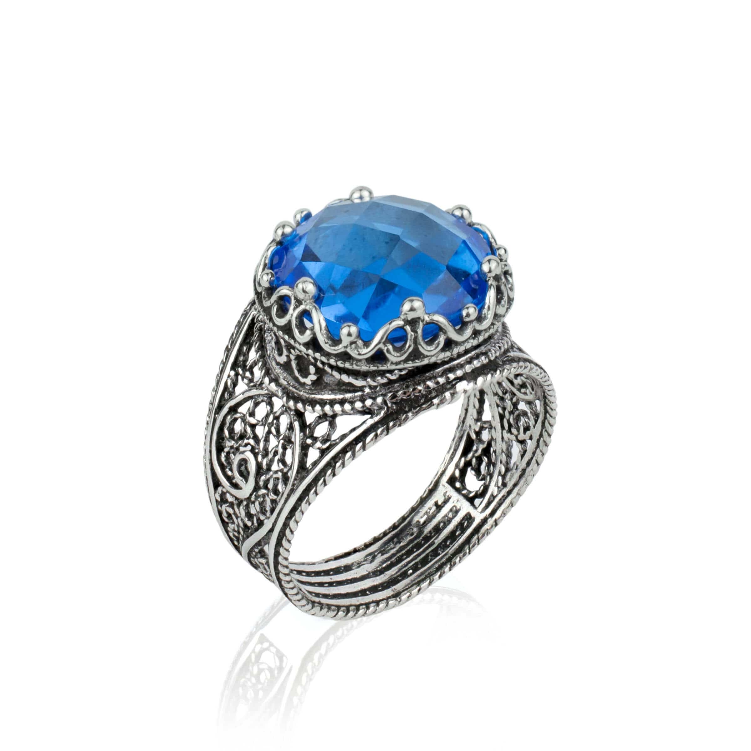 Handmade Filigree Art Blue Quartz Gemstone Crown Design ring in sterling silver, showcasing intricate craftsmanship and a stunning blue quartz centerpiece.