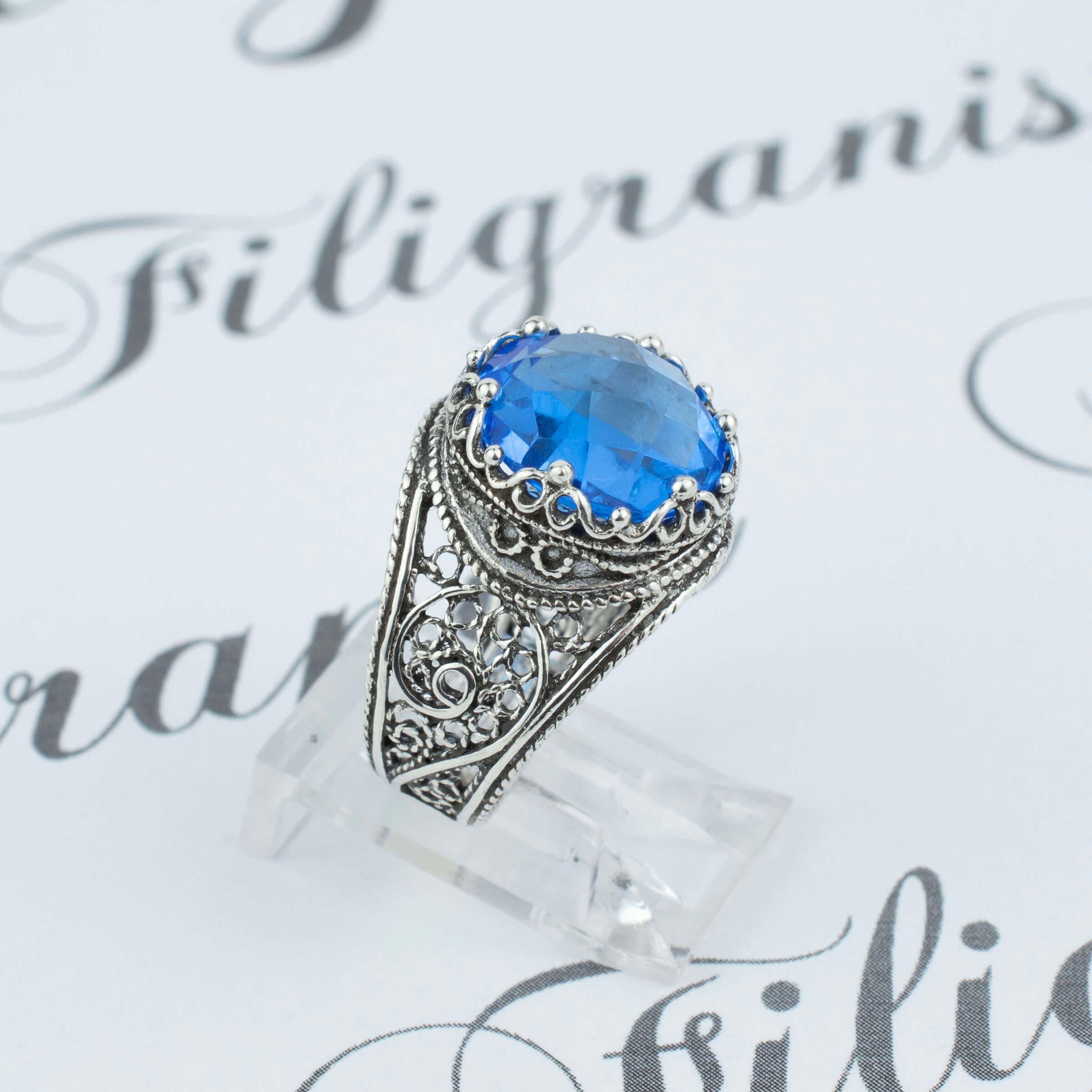 Handmade Filigree Art Blue Quartz Gemstone Crown Design ring in sterling silver, showcasing intricate craftsmanship and a stunning blue quartz centerpiece.