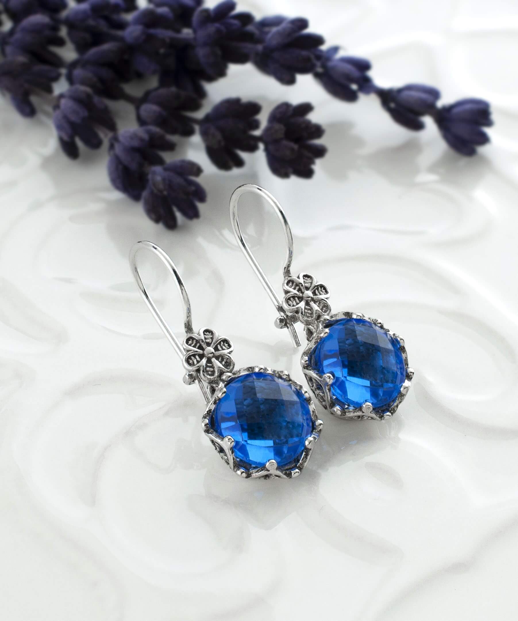 Elegant Filigree Art Blue Quartz Gemstone Drop Earrings in sterling silver, showcasing intricate design and sparkling gemstones.