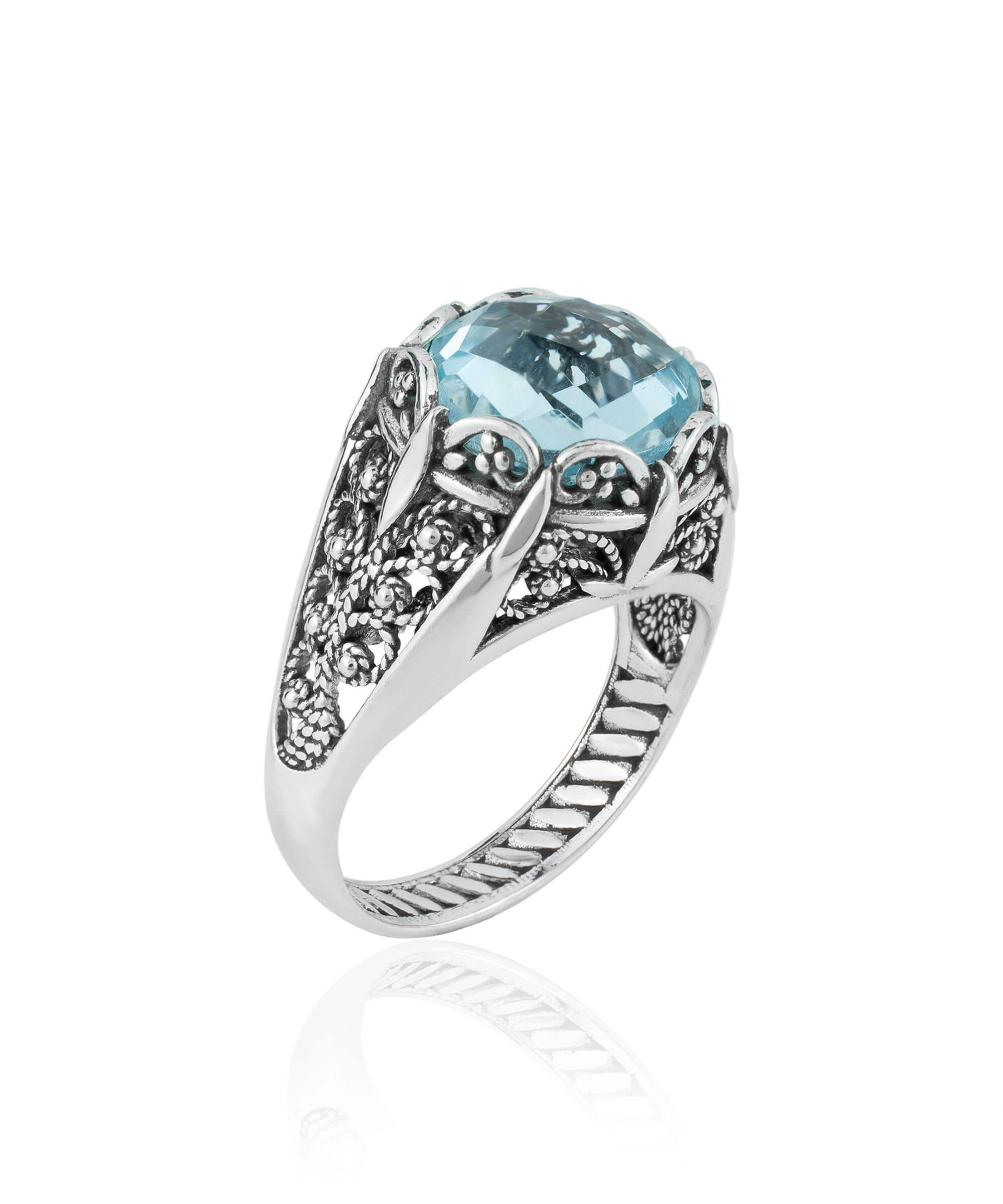 Elegant Filigree Art Blue Topaz Gemstone Silver Cocktail Ring with intricate design and polished finish.