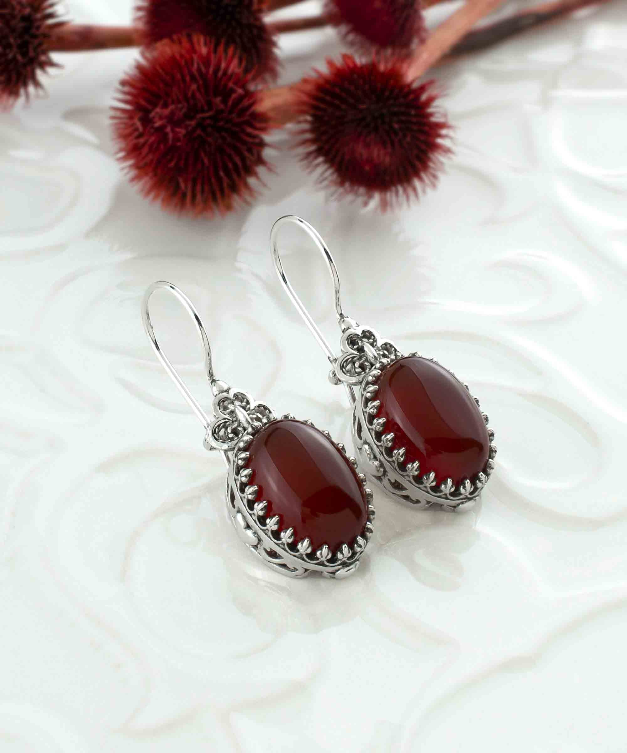 Elegant 925 sterling silver filigree heart earrings featuring a vibrant carnelian gemstone, perfect for women.