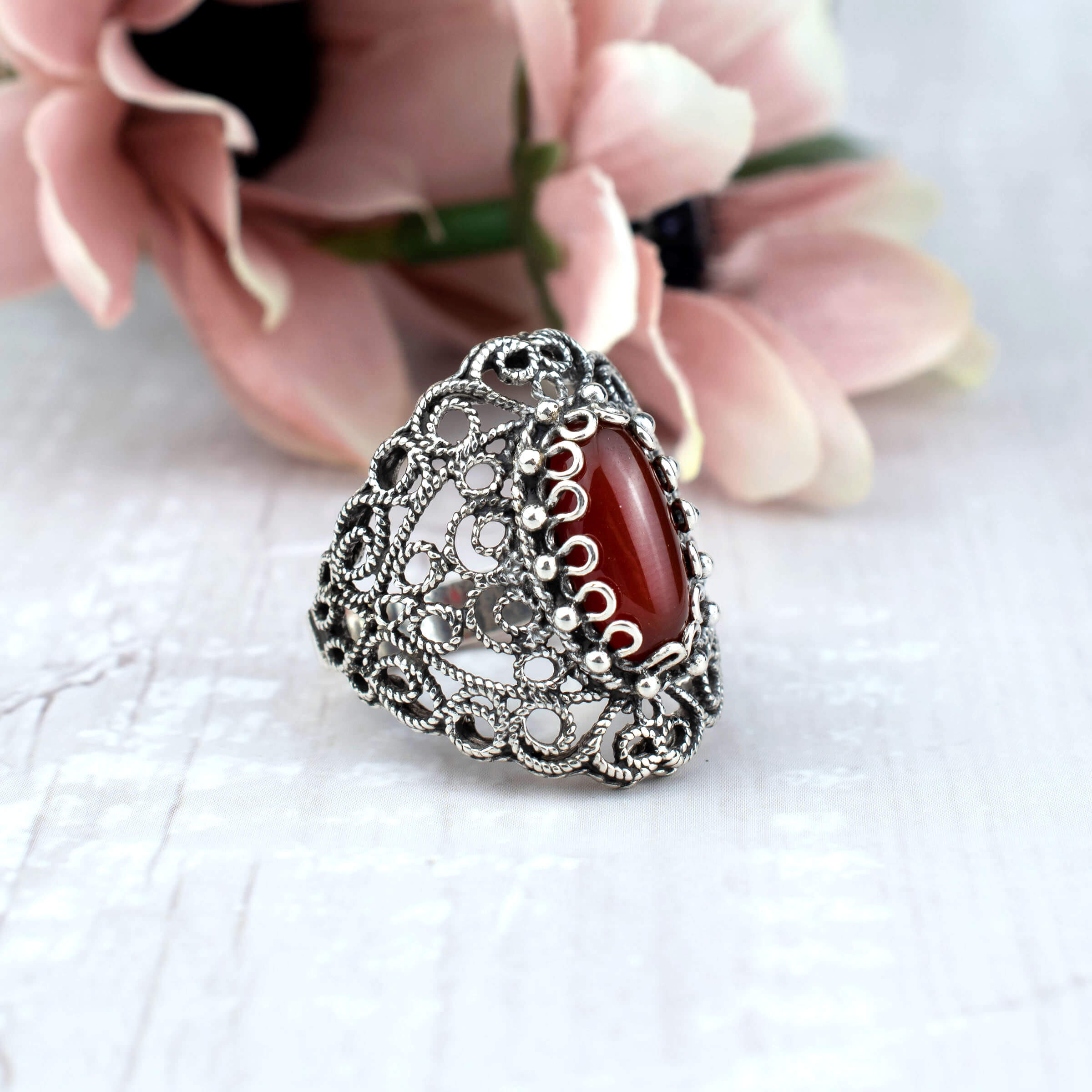 Handmade Filigree Art Carnelian Gemstone Lace Detailed Women's Silver Statement Ring featuring intricate design and vibrant carnelian stone.