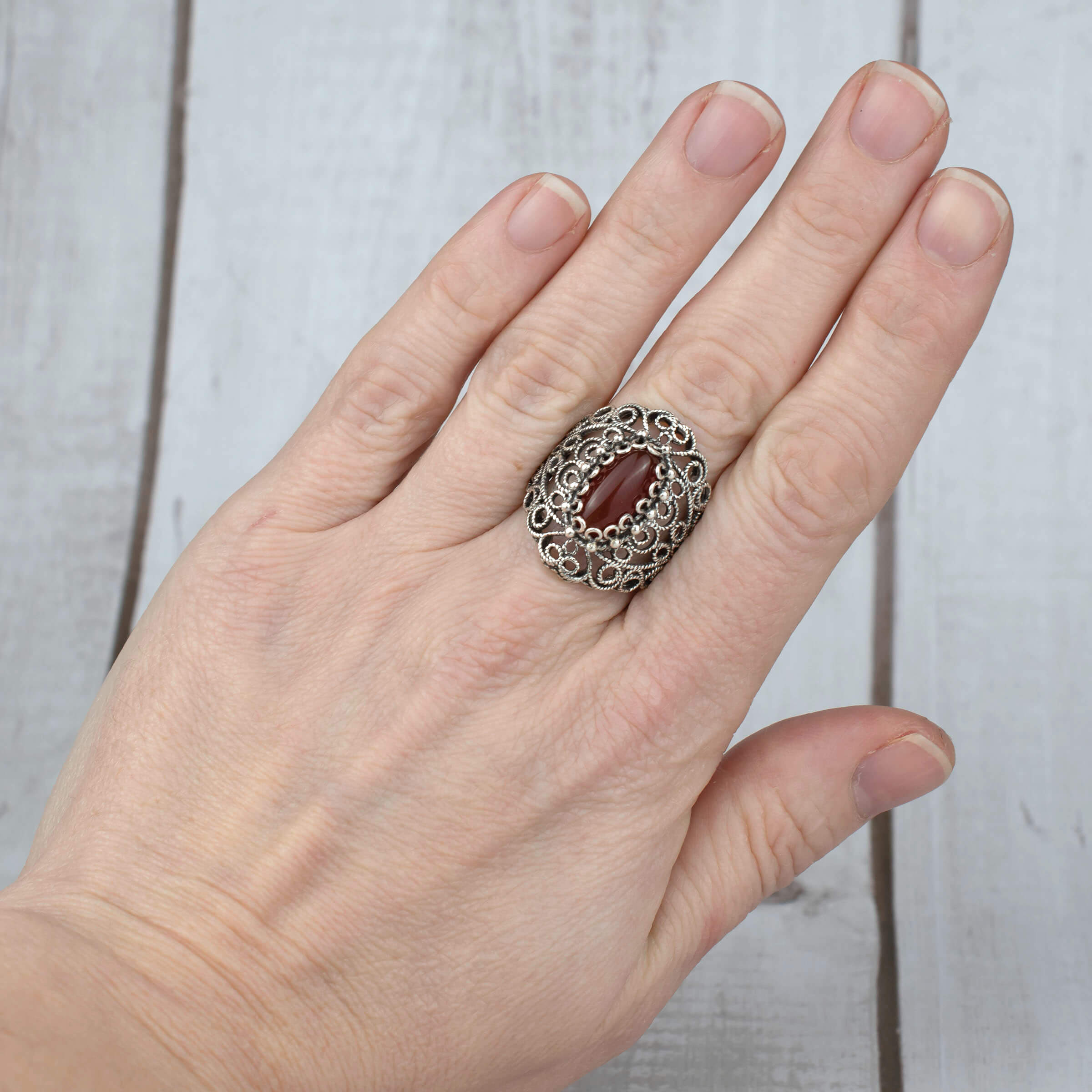 Handmade Filigree Art Carnelian Gemstone Lace Detailed Women's Silver Statement Ring featuring intricate design and vibrant carnelian stone.