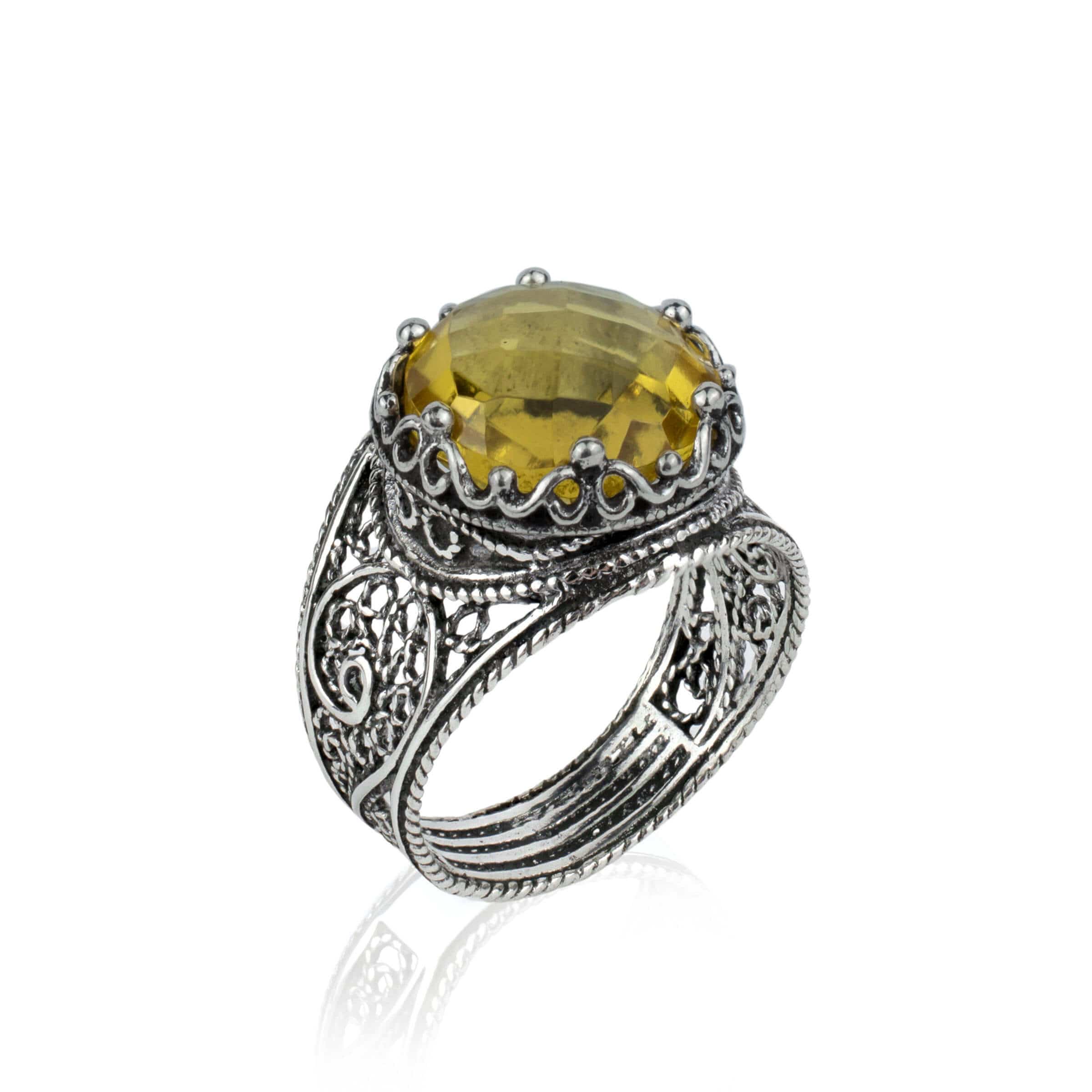 Handmade filigree art silver ring featuring a stunning 12mm citrine gemstone in a crown design, showcasing intricate craftsmanship.