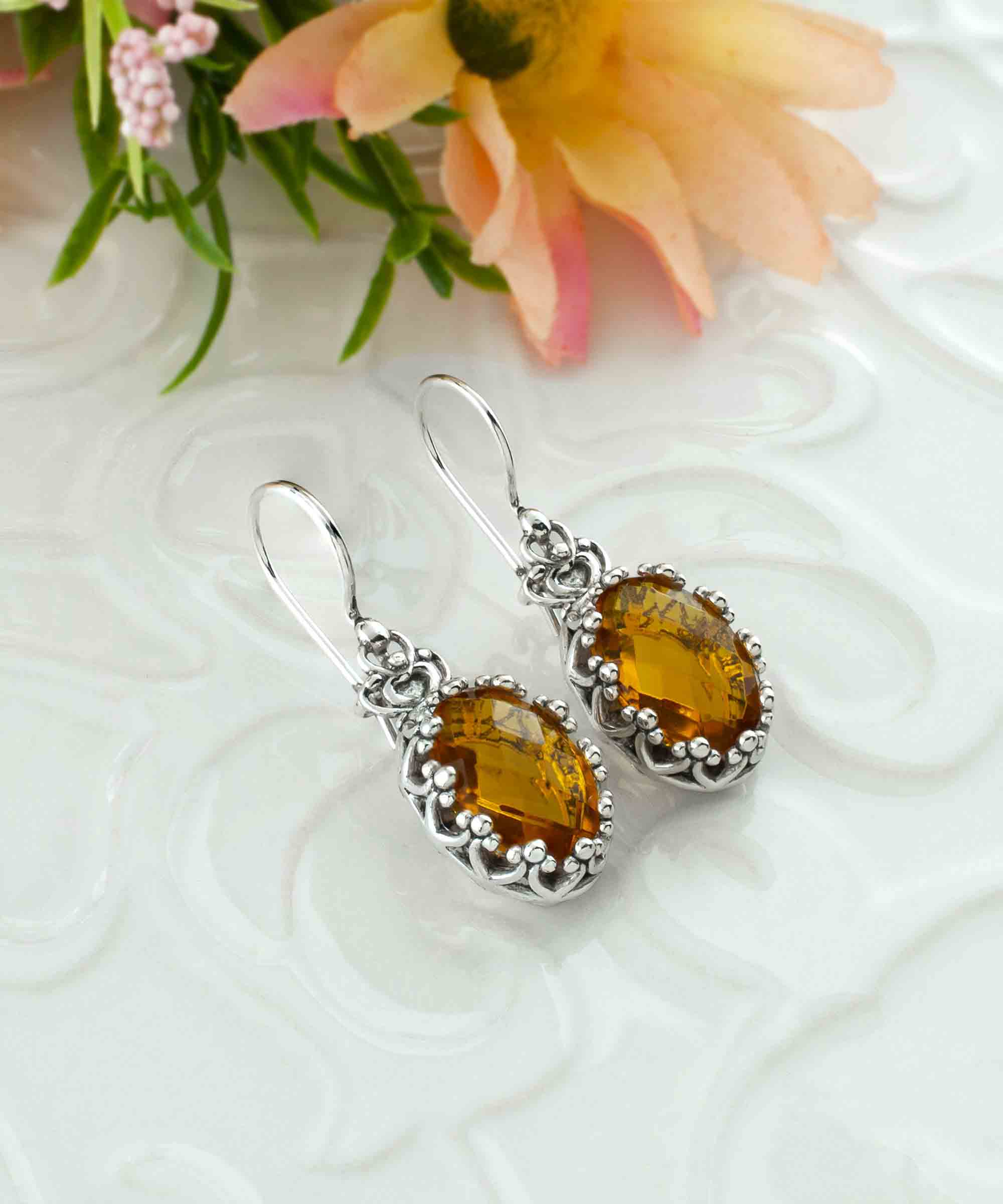 Elegant Filigree Art Citrine Gemstone Crown Earrings in sterling silver, featuring intricate design and a stunning oval drop shape.