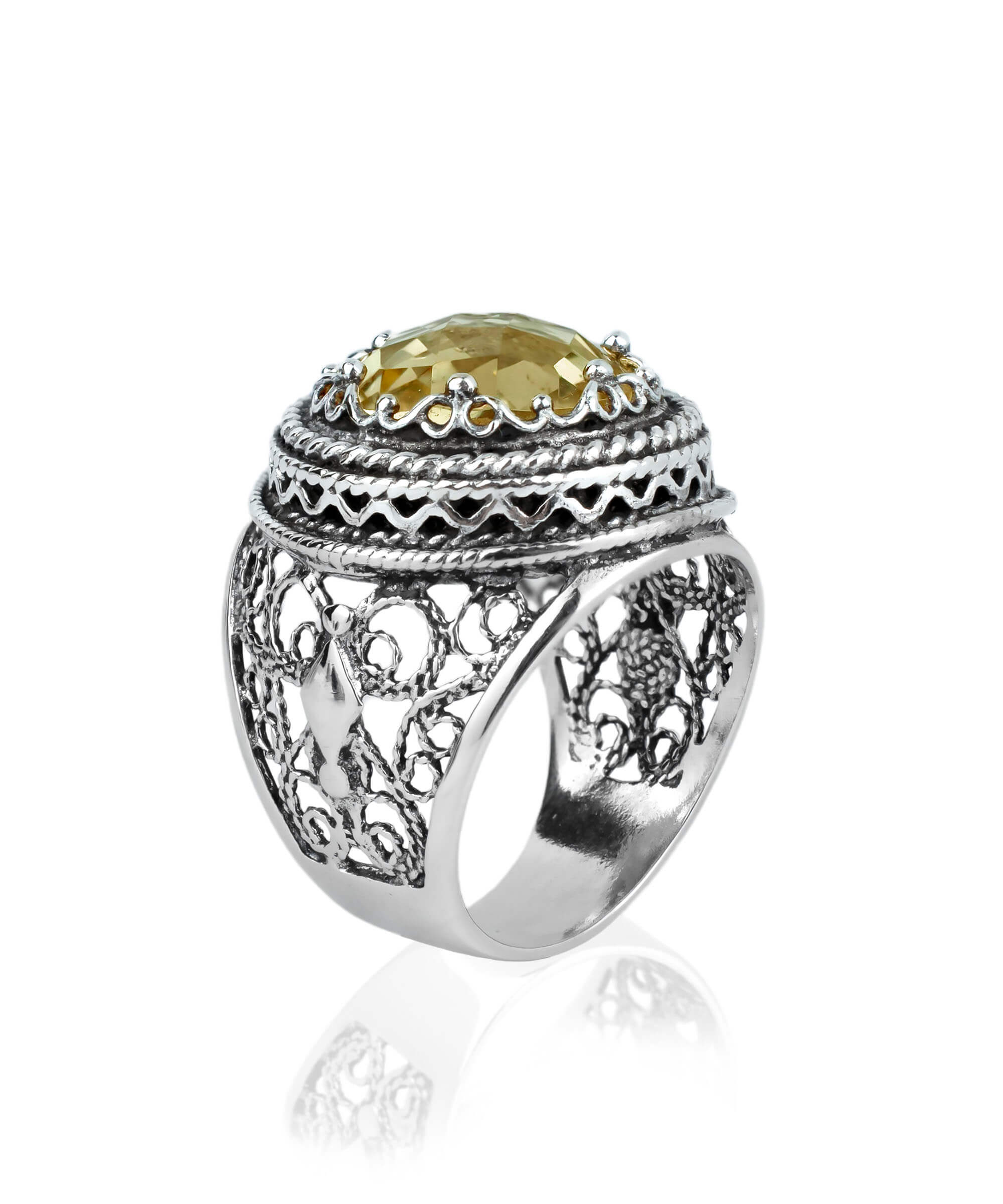 A stunning sterling silver bold ring featuring a 12mm double-sided faceted citrine gemstone, showcasing intricate filigree art design.