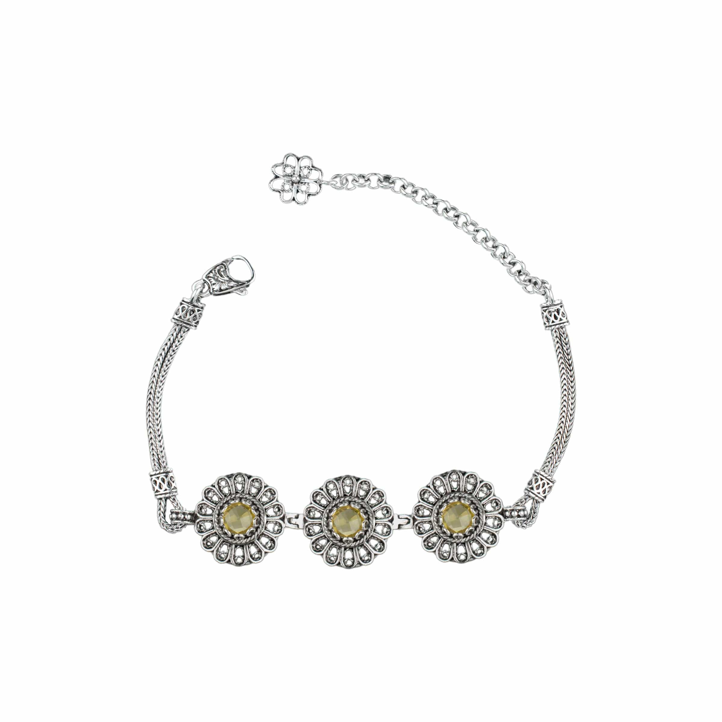 Elegant sterling silver filigree bracelet featuring a double-sided faceted citrine gemstone, perfect for women.