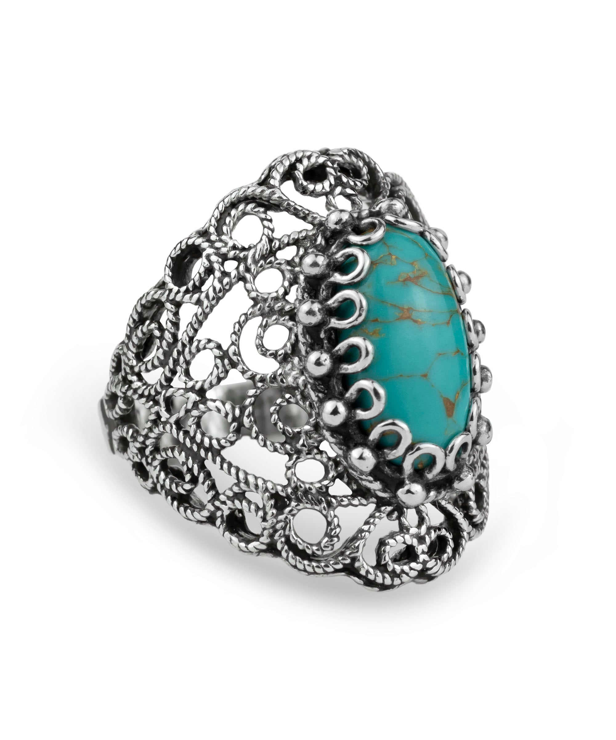 Handmade silver statement ring featuring intricate filigree design and a copper turquoise gemstone centerpiece.