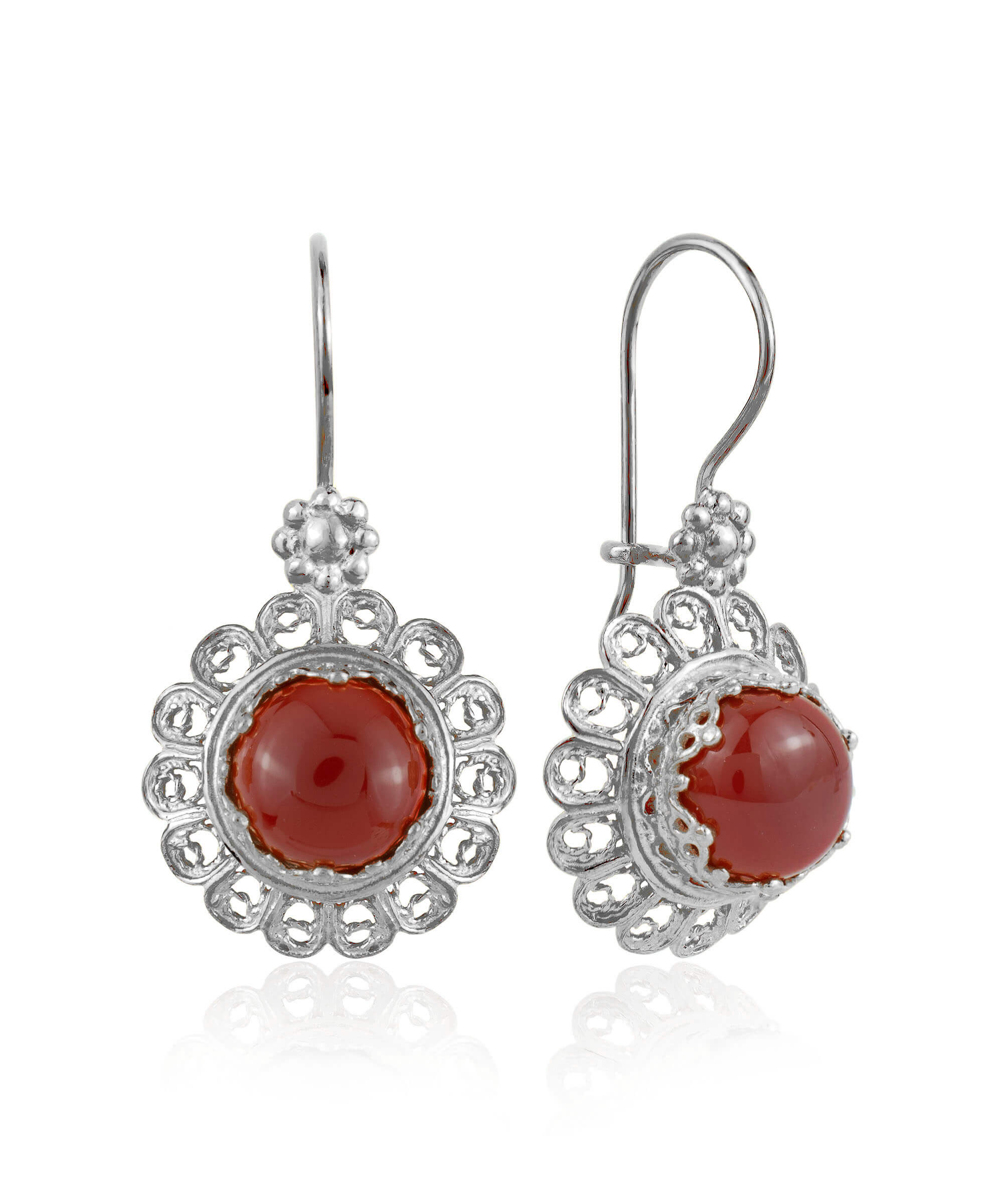 Handmade silver drop earrings featuring a filigree flower design and vibrant ruby quartz gemstone.