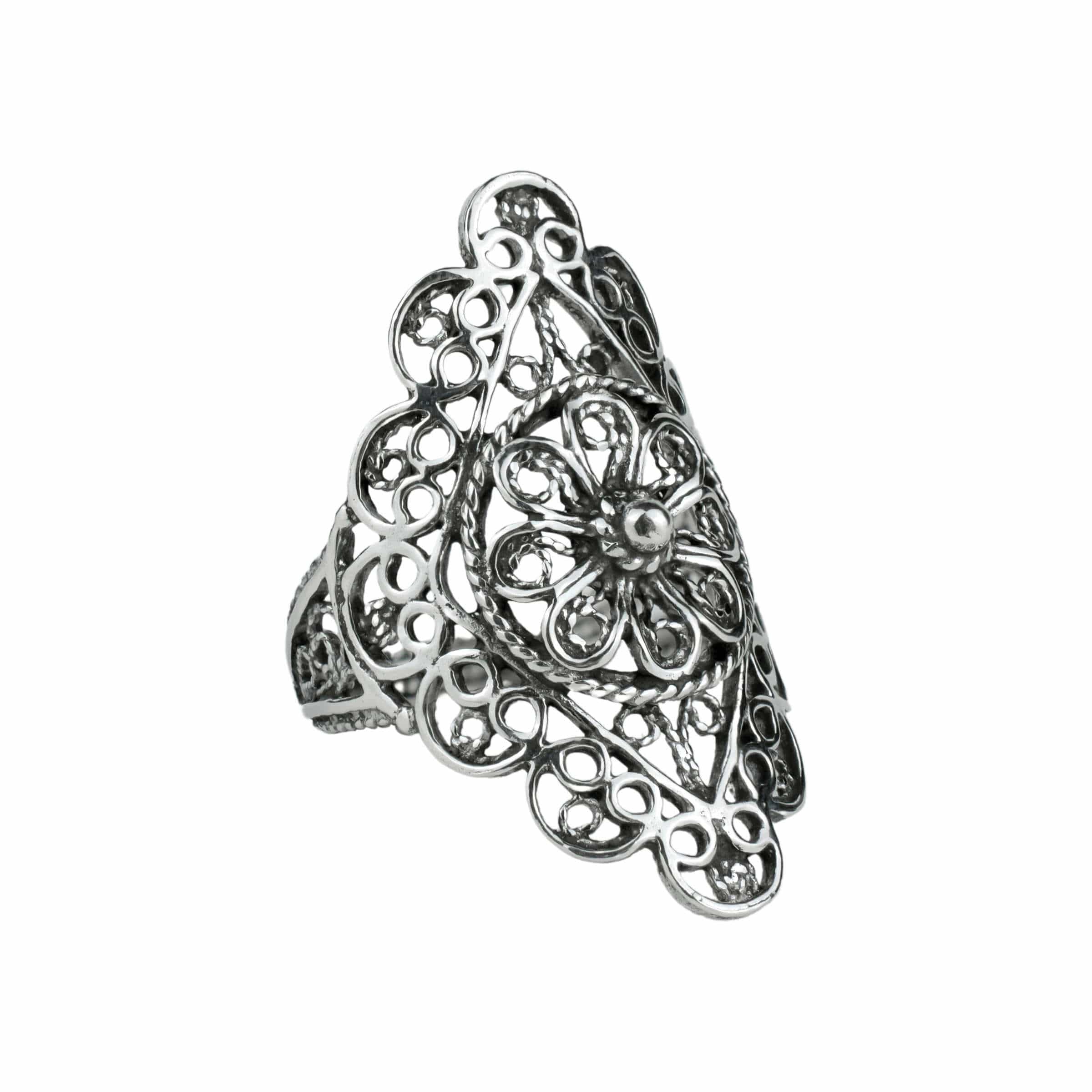 A stunning silver statement ring featuring intricate filigree and lace embroidery, showcasing timeless elegance and craftsmanship.