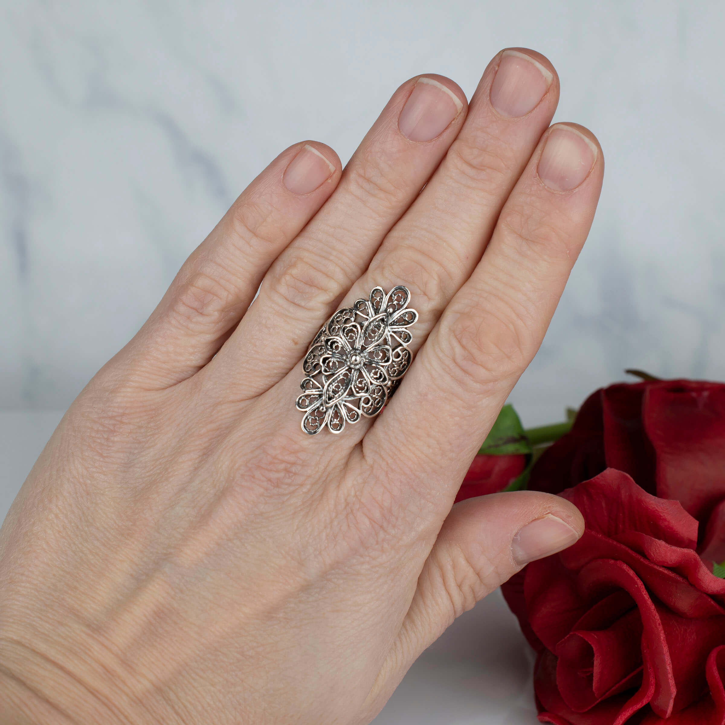 Sterling Silver Filigree Art Lace Embroidery Long Statement Ring showcasing intricate lace-like design and polished finish.