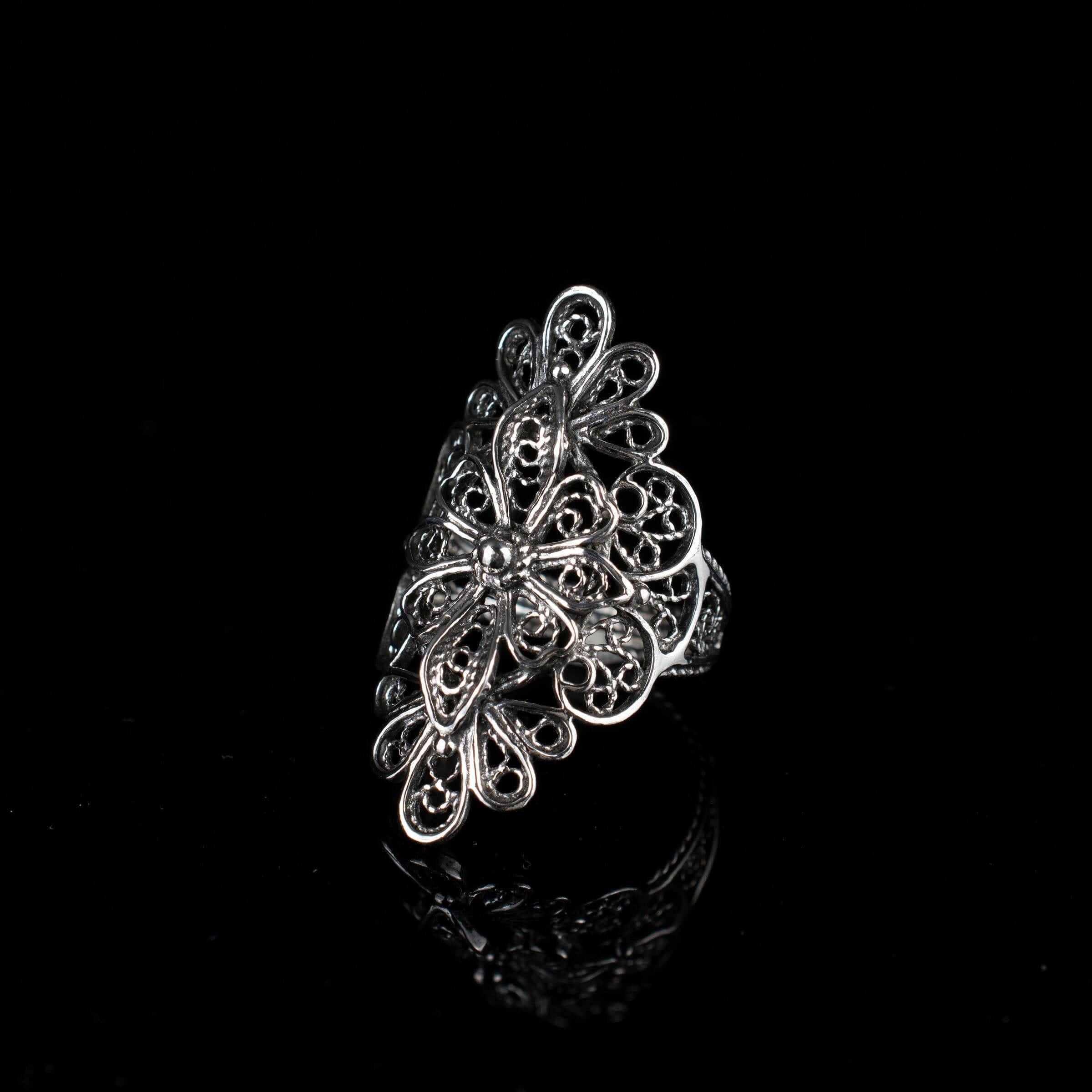 Sterling Silver Filigree Art Lace Embroidery Long Statement Ring showcasing intricate lace-like design and polished finish.