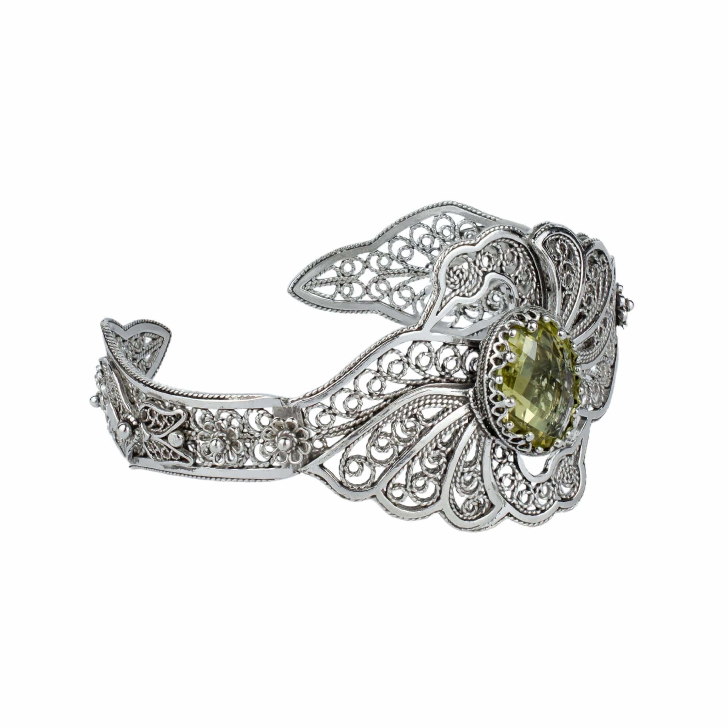 Sterling silver cuff bracelet featuring double swan design and lemon quartz gemstone, elegantly crafted with filigree art.