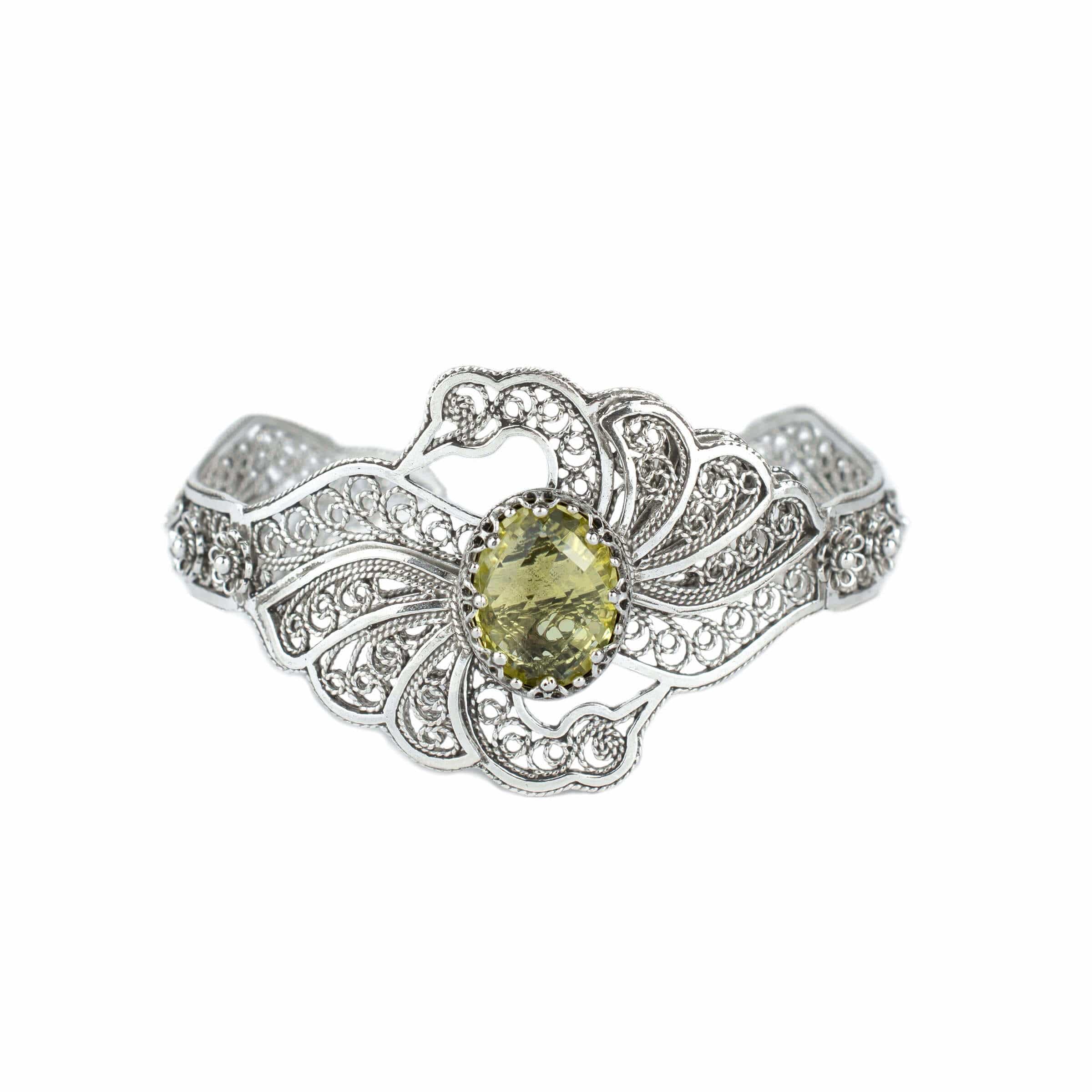 Sterling silver cuff bracelet featuring double swan design and lemon quartz gemstone, elegantly crafted with filigree art.