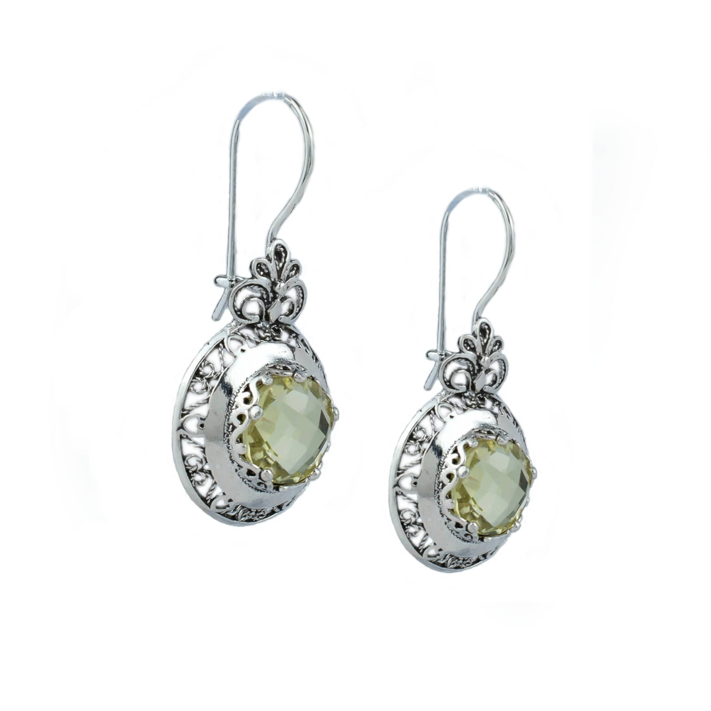 Elegant silver drop earrings featuring intricate filigree art and vibrant lemon quartz gemstones, perfect for women.