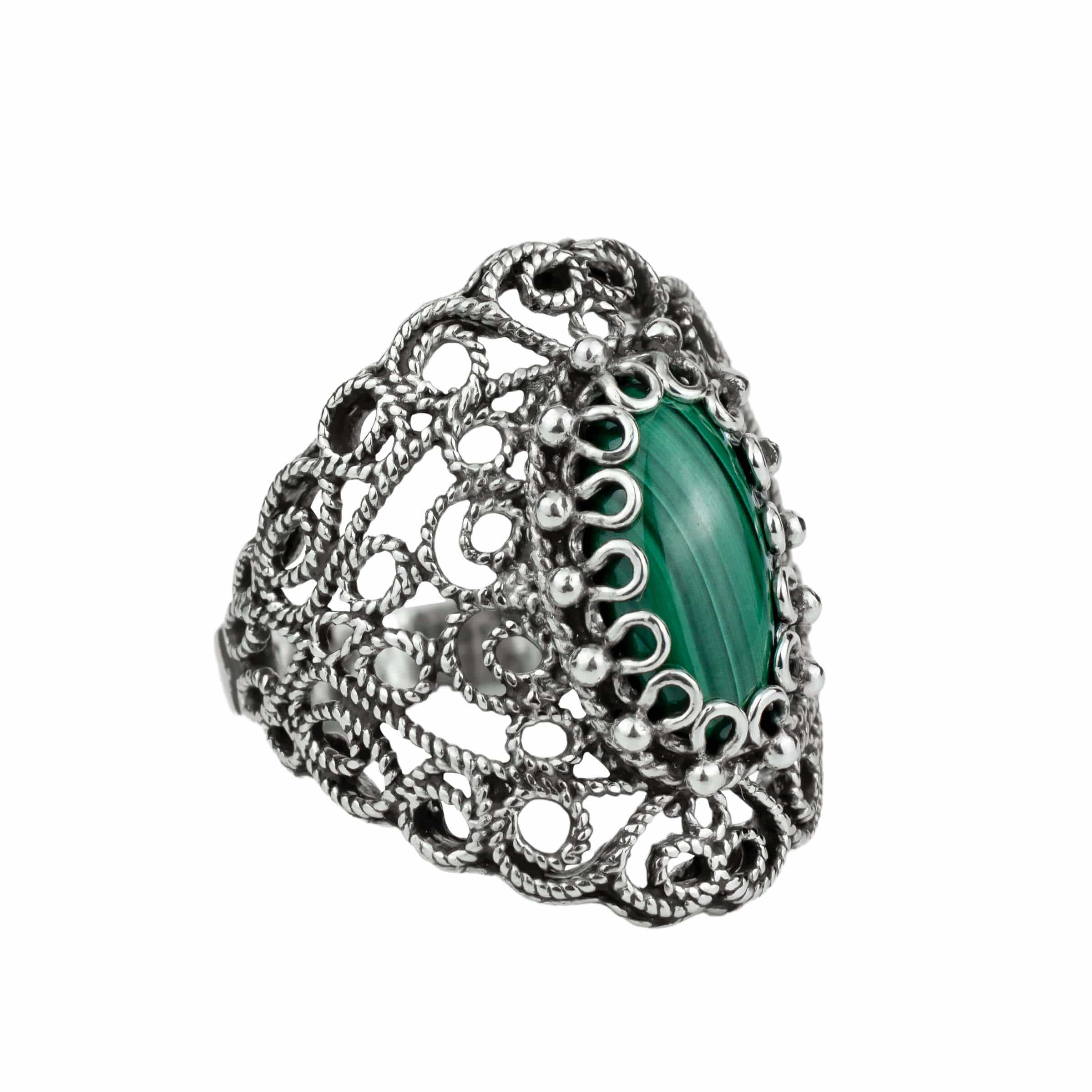 Handmade silver statement ring featuring a malachite gemstone with intricate filigree lace detailing, showcasing elegance and craftsmanship.