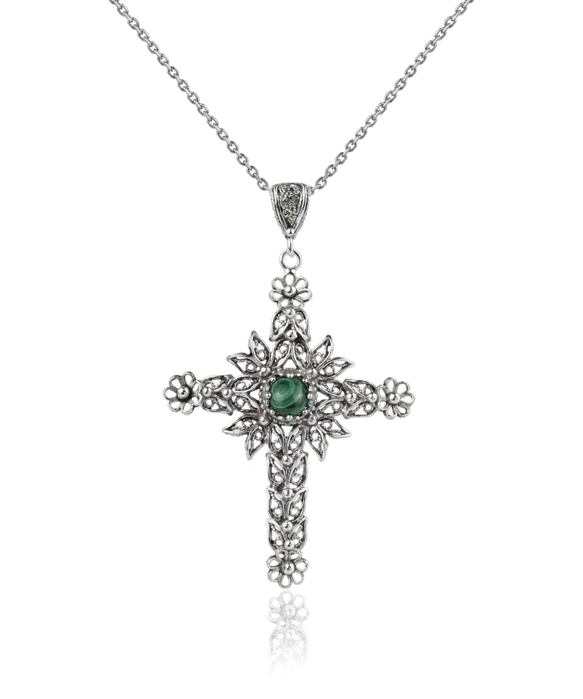 Elegant silver cross pendant necklace featuring intricate filigree art and a round-cut malachite gemstone, perfect for women.