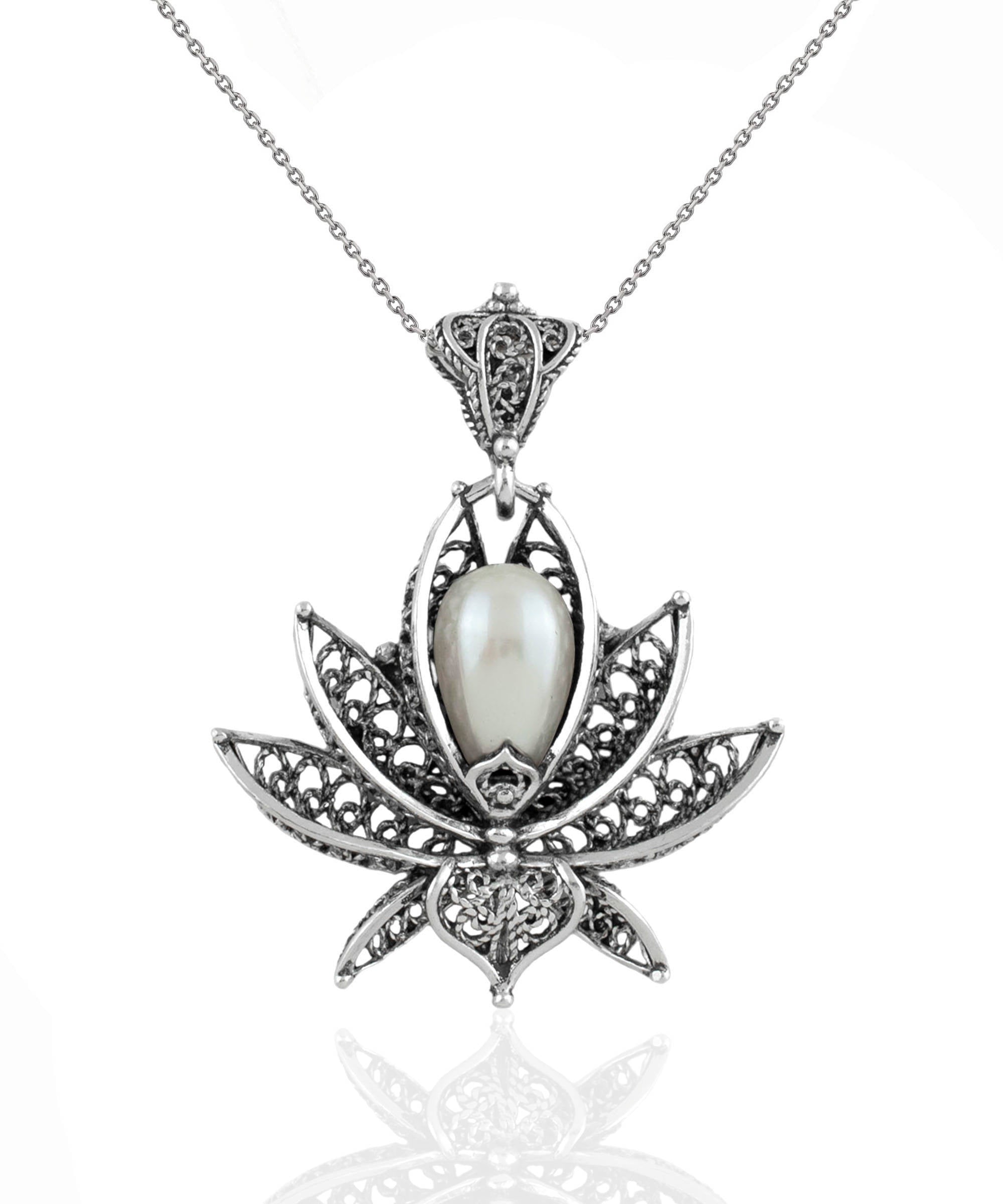 A beautifully crafted 3D lotus flower pendant made of 925 Sterling Silver with a cultured freshwater pearl, showcasing intricate filigree details.