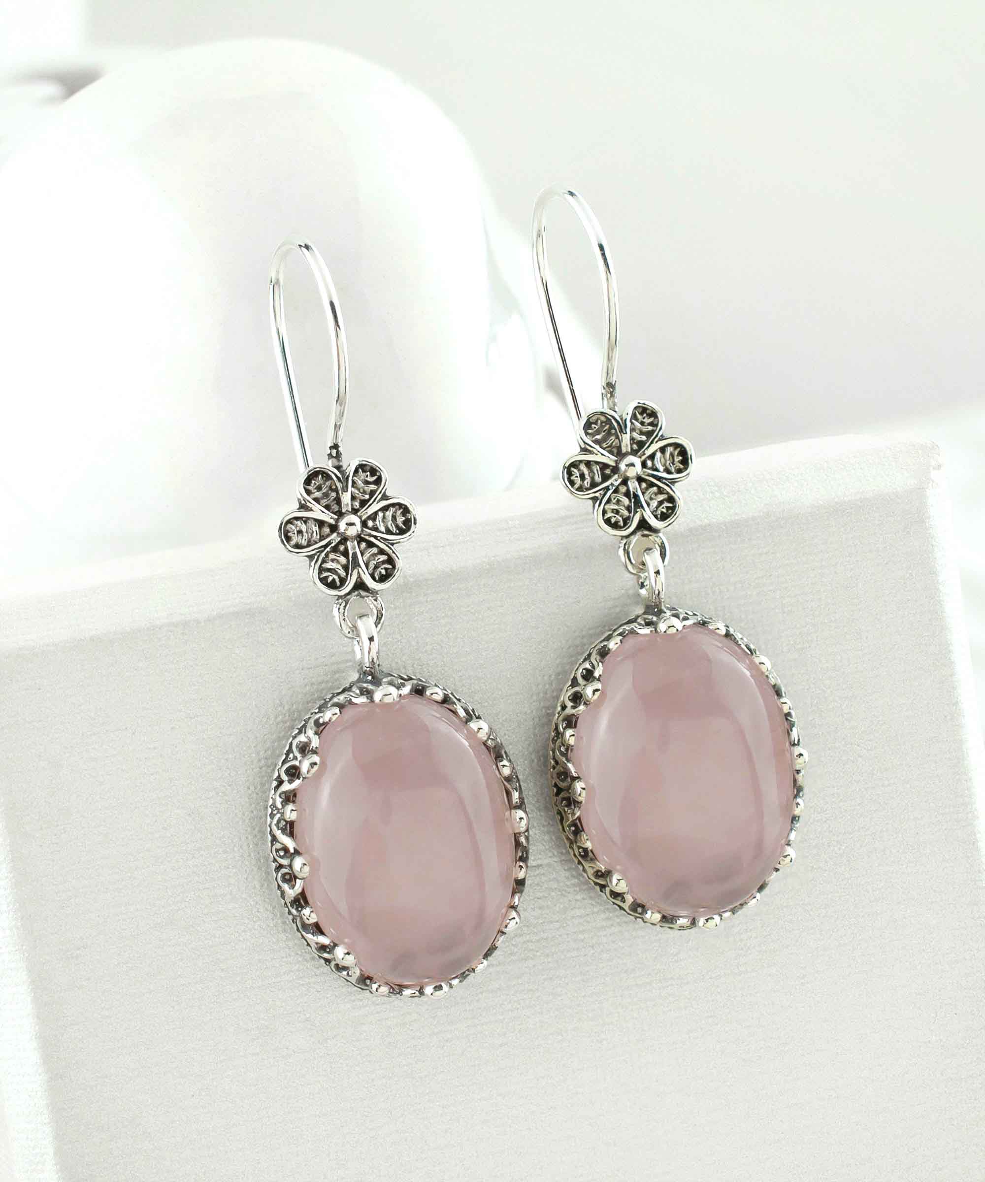 Elegant Filigree Art Rose Quartz Gemstone Dangle Earrings in sterling silver, showcasing intricate designs and a beautiful pink hue.