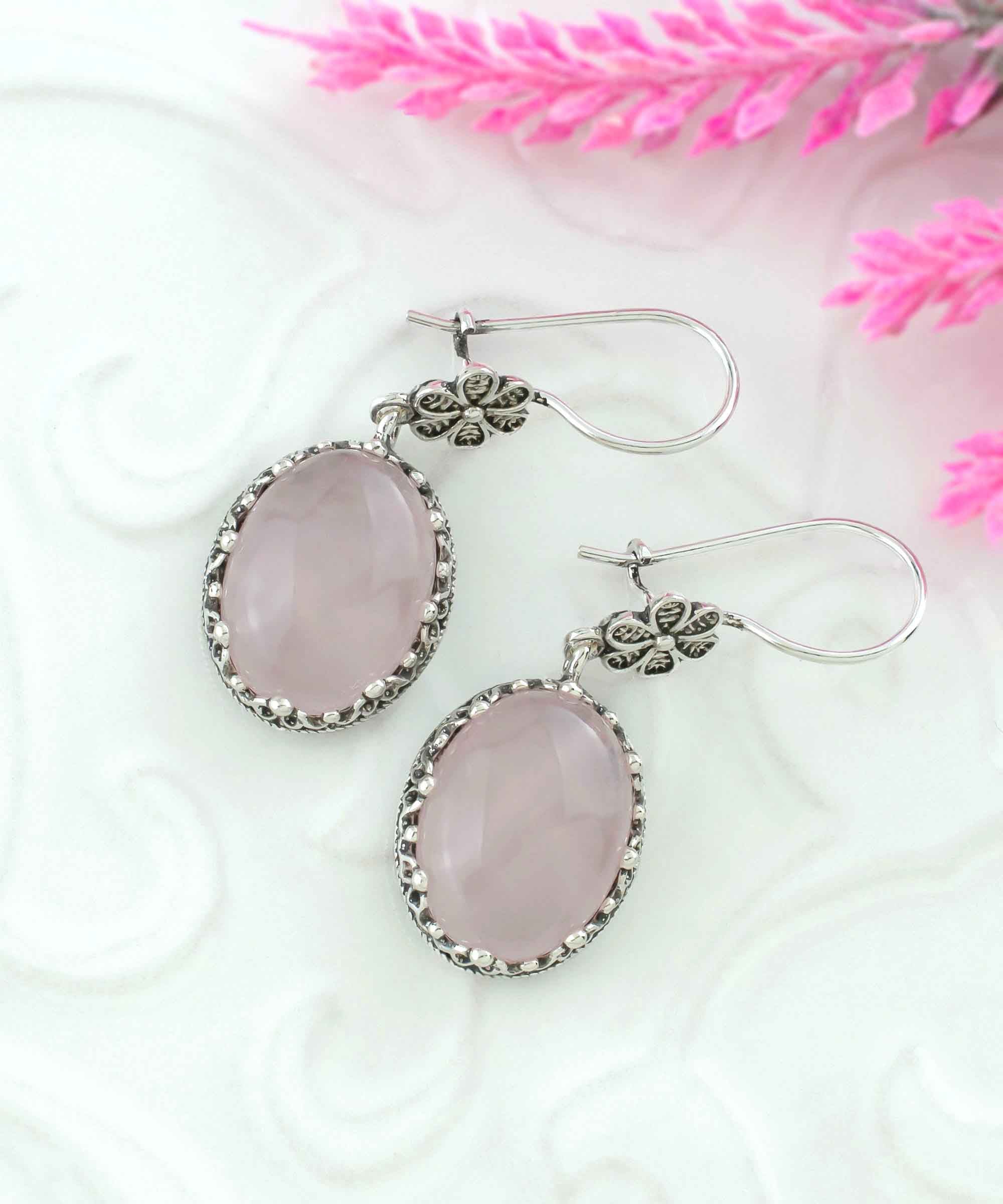 Elegant Filigree Art Rose Quartz Gemstone Dangle Earrings in sterling silver, showcasing intricate designs and a beautiful pink hue.