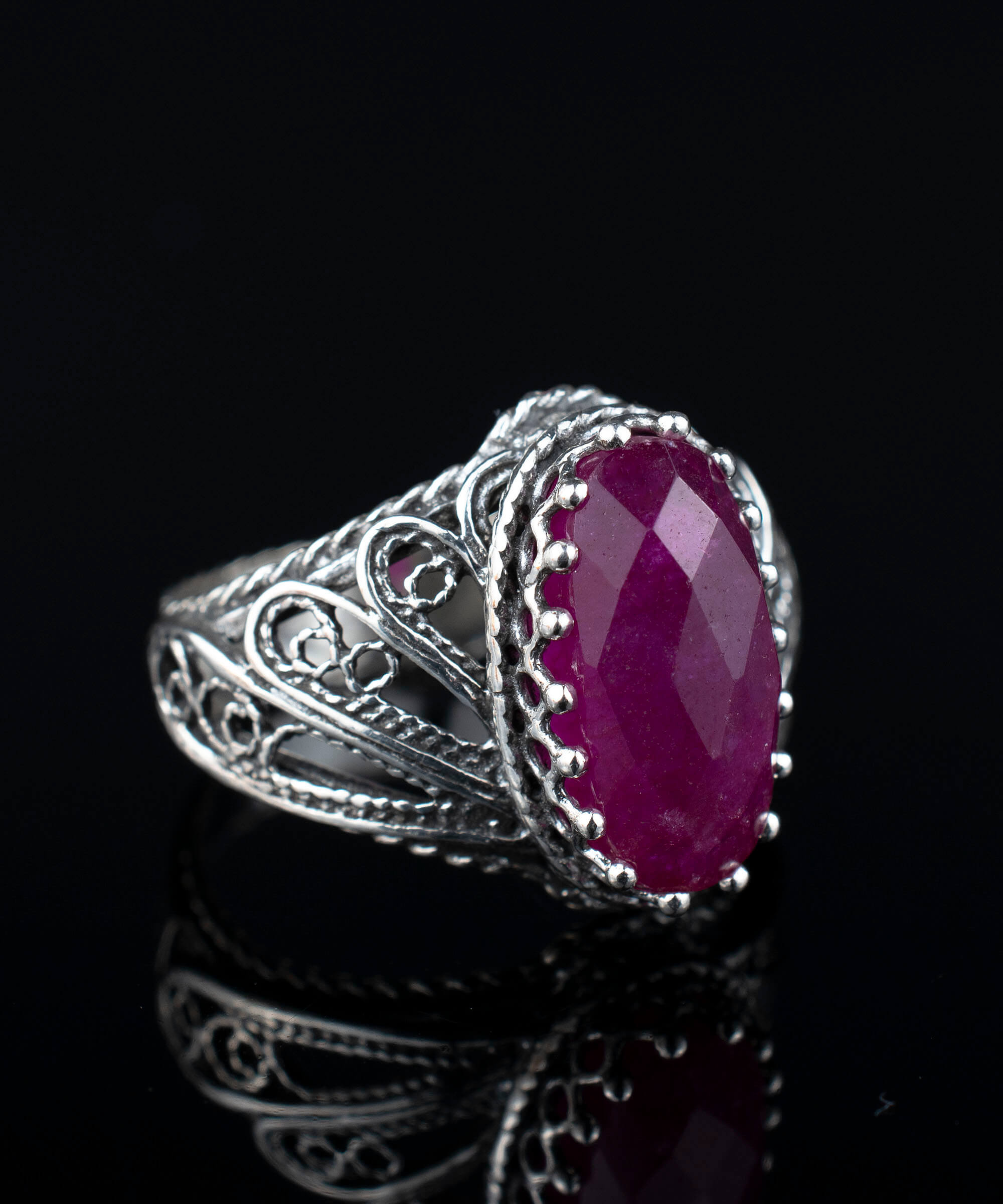 Filigree Art Ruby Corundum Gemstone Angel Design ring in 925 sterling silver, showcasing intricate angel motifs and a vibrant ruby gemstone.