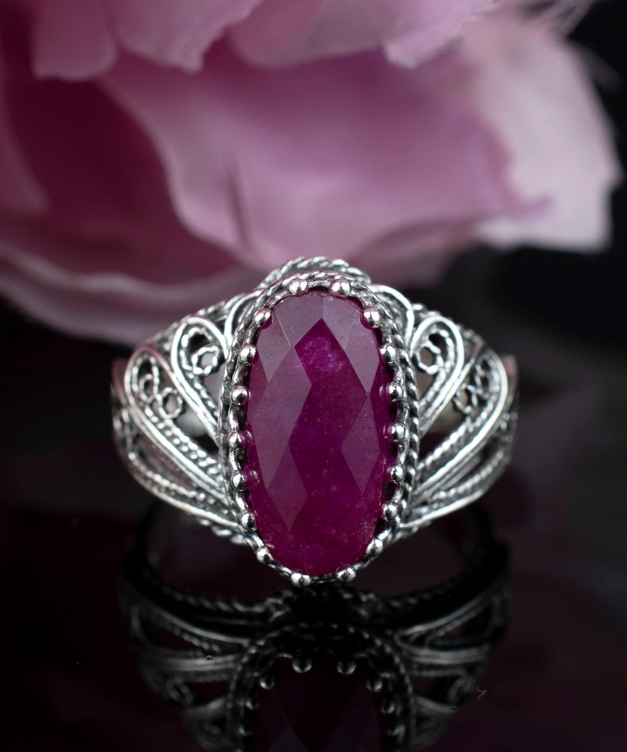 Filigree Art Ruby Corundum Gemstone Angel Design ring in 925 sterling silver, showcasing intricate angel motifs and a vibrant ruby gemstone.