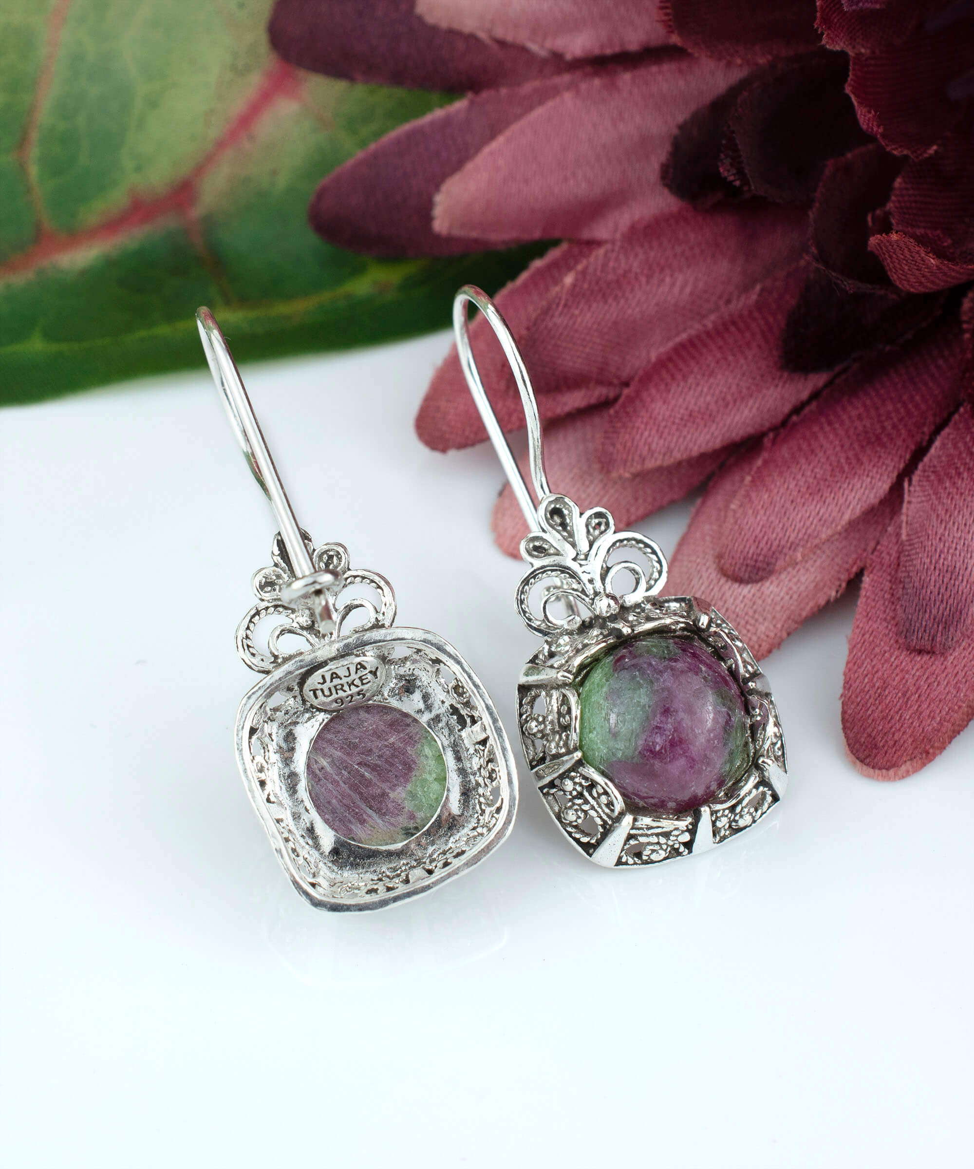 Elegant silver drop earrings featuring intricate filigree work and vibrant ruby zoisite gemstones, perfect for women.