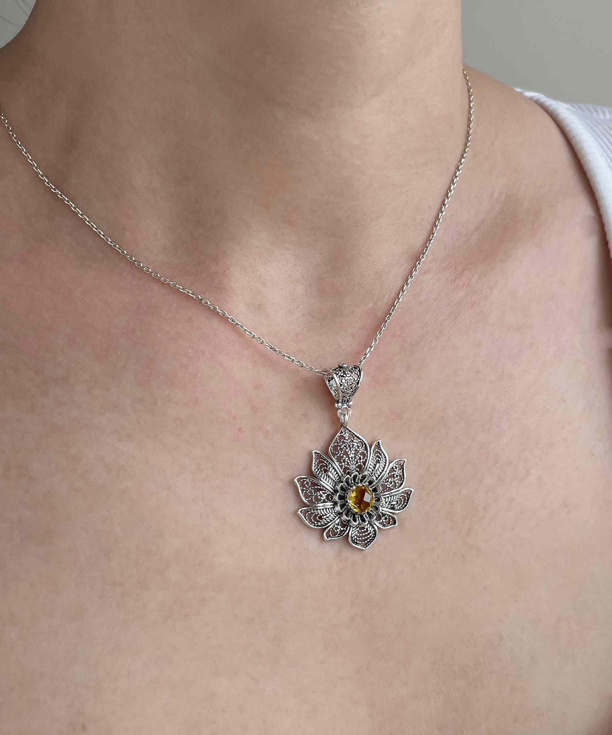 Handcrafted 925 Sterling Silver Lotus Flower Pendant with Citrine Gemstone, showcasing intricate filigree art design.