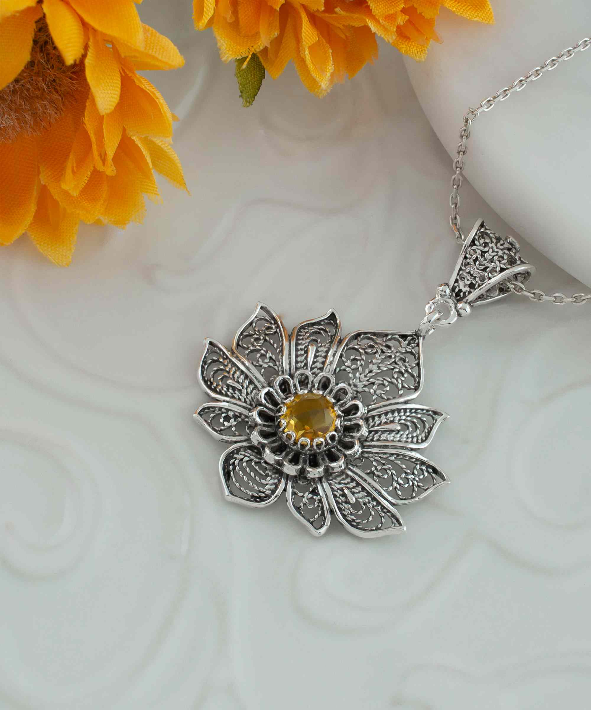 Handcrafted 925 Sterling Silver Lotus Flower Pendant with Citrine Gemstone, showcasing intricate filigree art design.