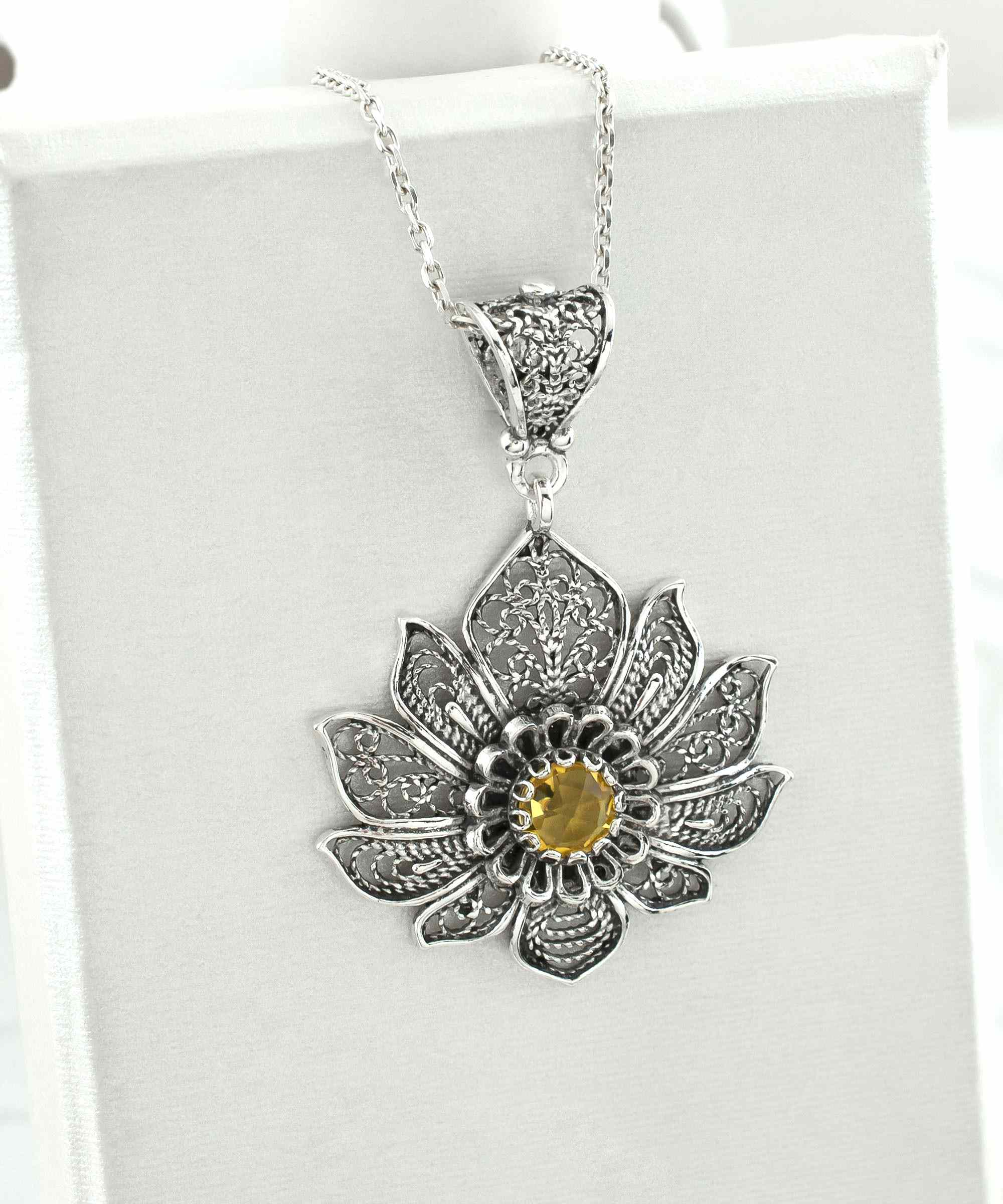 Handcrafted 925 Sterling Silver Lotus Flower Pendant with Citrine Gemstone, showcasing intricate filigree art design.