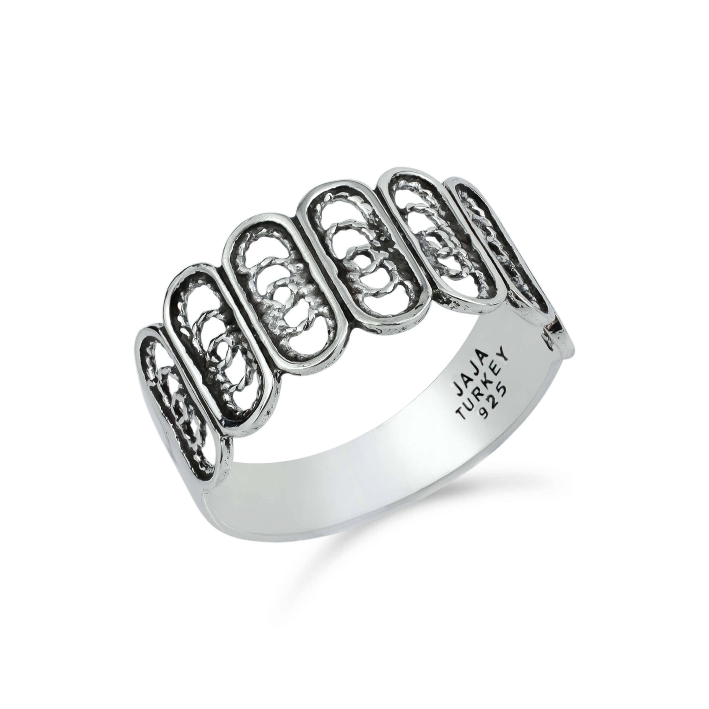 Elegant Filigree Art Sterling Silver Band Ring with oval design, showcasing intricate metal strands and a polished finish.