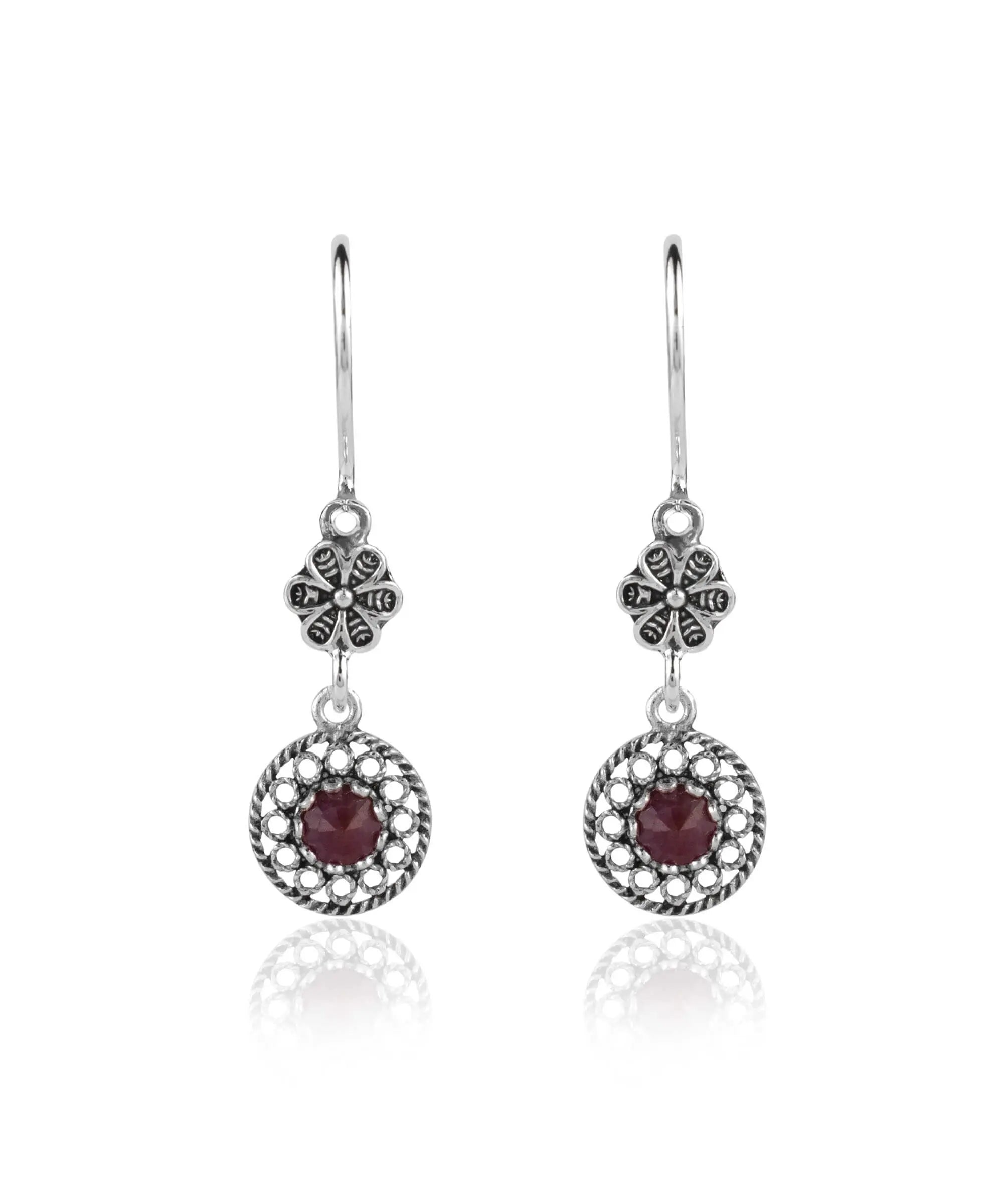 Elegant handmade silver dangle earrings featuring cabochon cut gemstones in various colors, showcasing intricate filigree design.