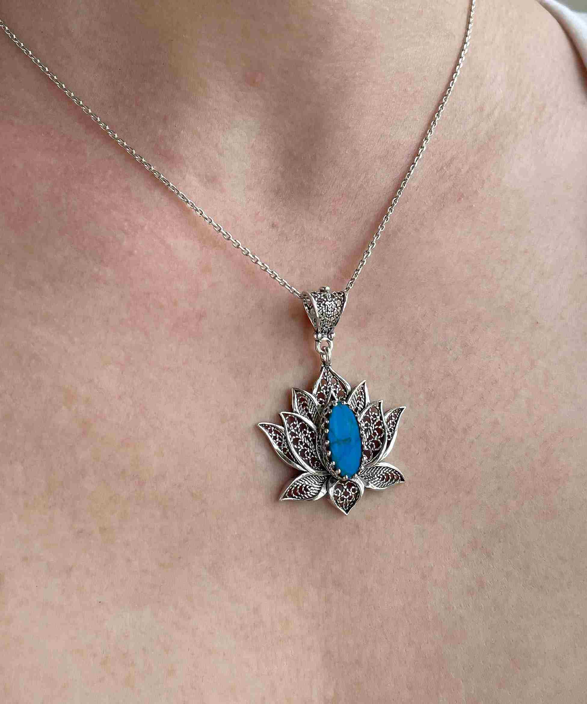 Elegant 925 Sterling Silver pendant necklace featuring a turquoise gemstone lotus flower with intricate filigree design.