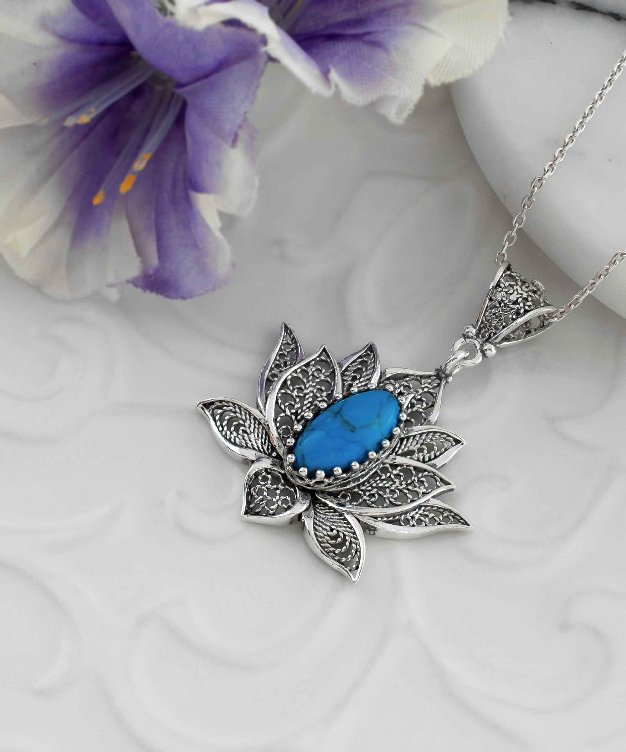 Elegant 925 Sterling Silver pendant necklace featuring a turquoise gemstone lotus flower with intricate filigree design.