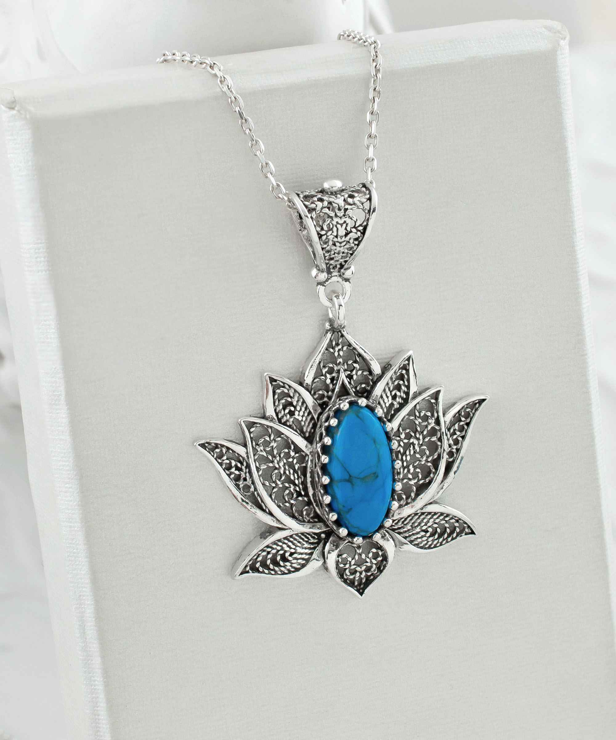 Elegant 925 Sterling Silver pendant necklace featuring a turquoise gemstone lotus flower with intricate filigree design.