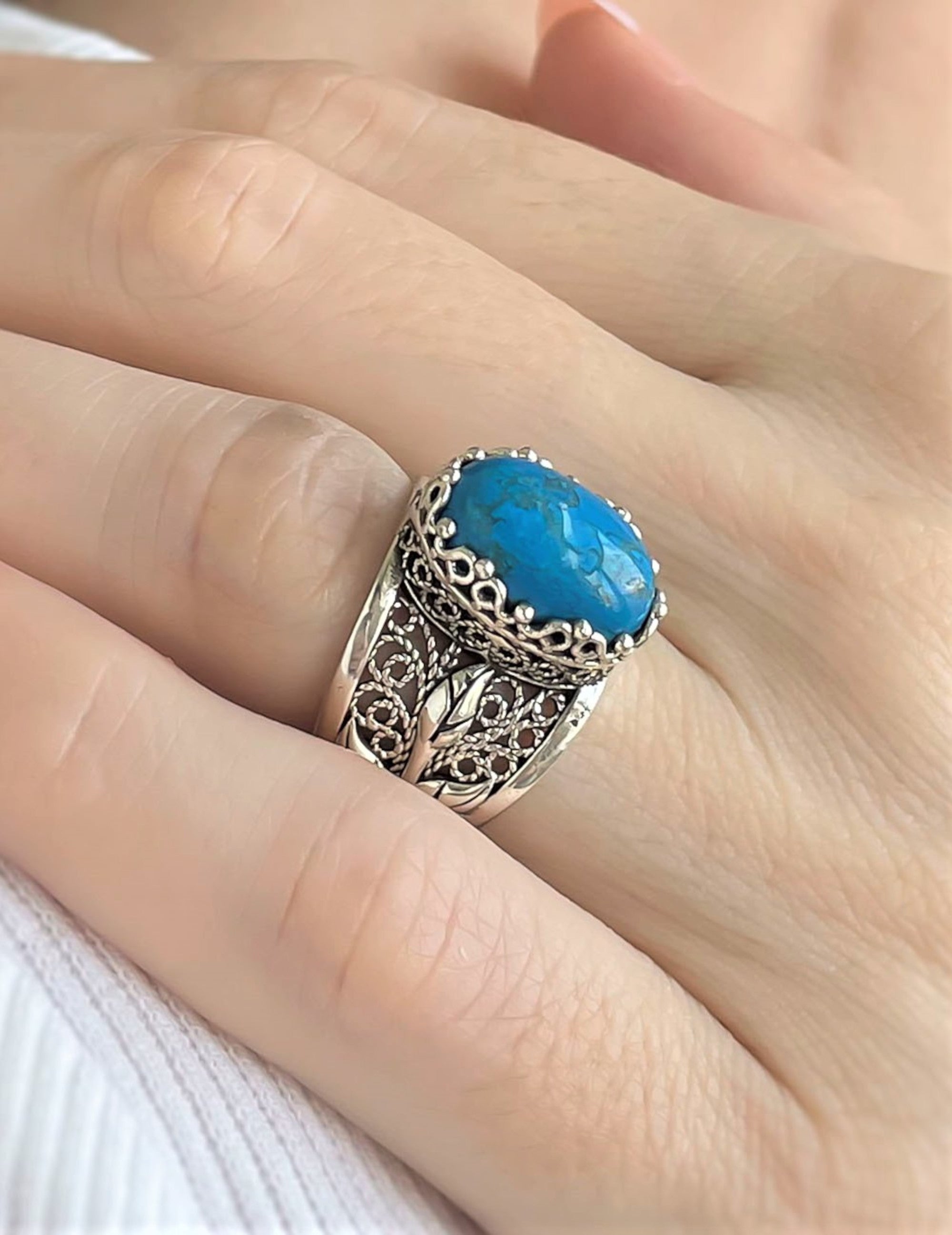 Elegant 925 Sterling Silver ring featuring a lab-created Turquoise Gemstone in a filigree design, perfect for women.