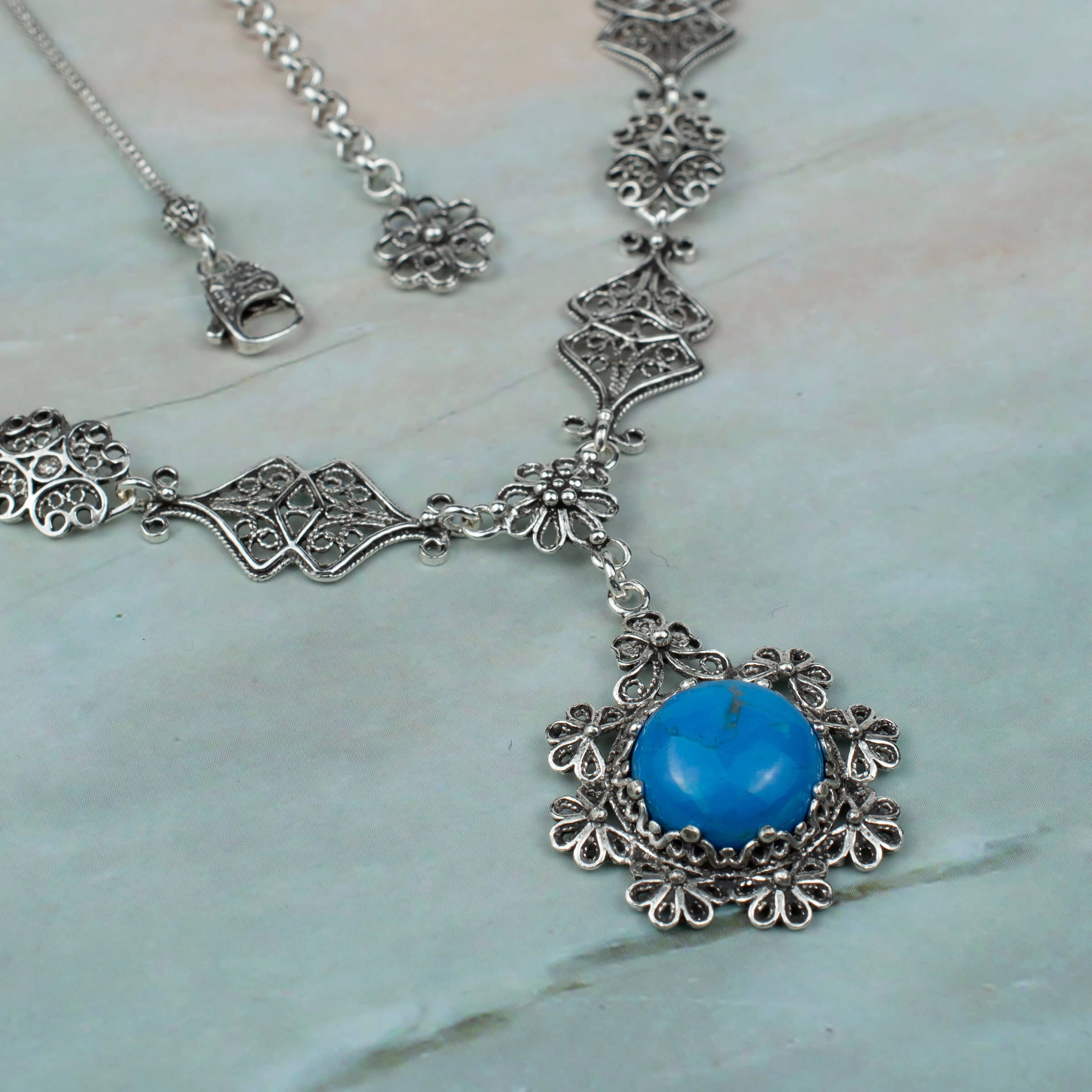 A stunning 925 sterling silver choker necklace featuring a turquoise gemstone in a delicate filigree design, perfect for women.