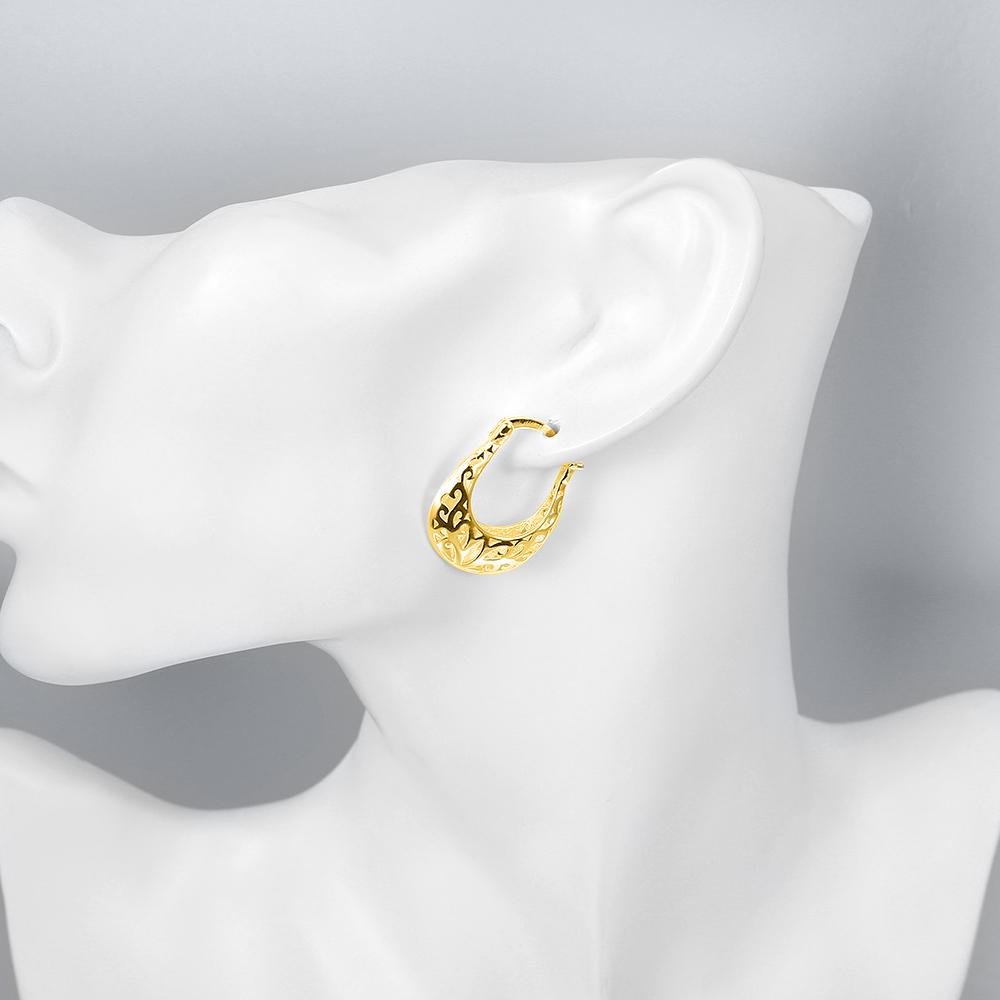 Elegant 18K gold plated filigree leverback French lock earrings, showcasing intricate design and hypoallergenic features.