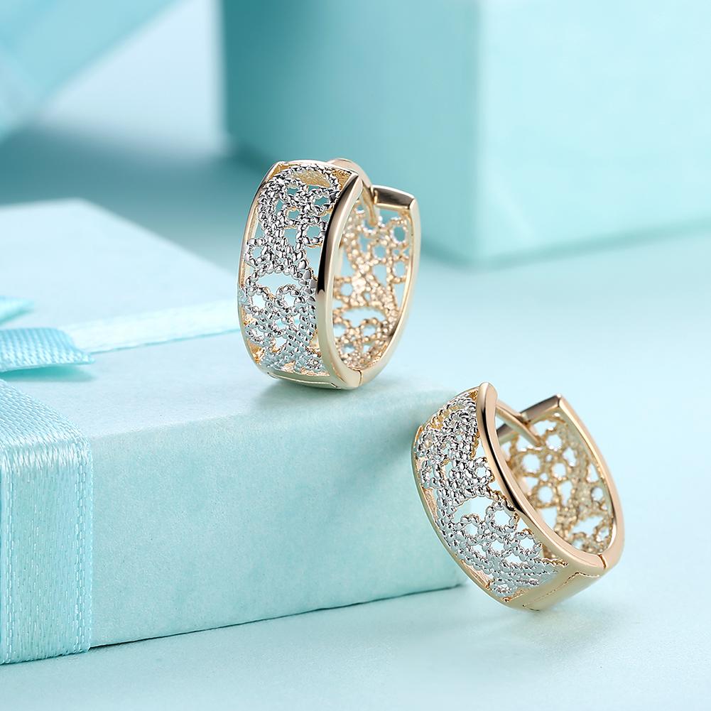 Elegant Filigree Wired Out Earrings in 14K Gold with certified crystals, showcasing intricate design and lightweight comfort.