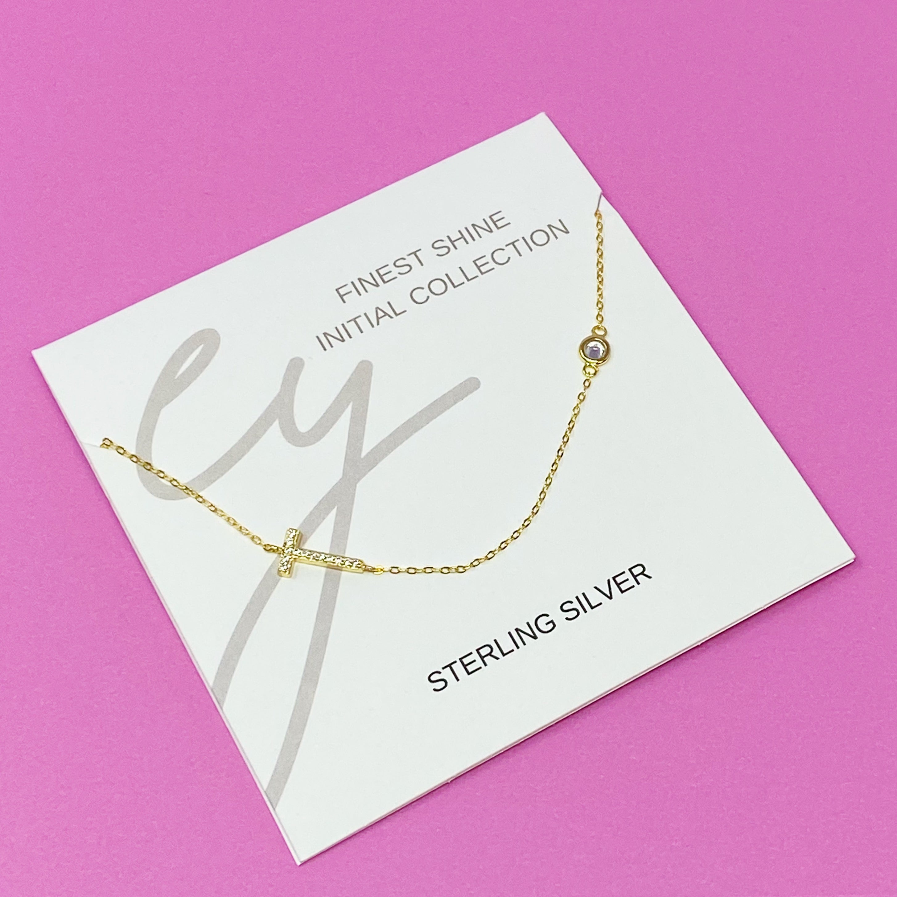 Finest Shine Initial Sterling Silver Necklace featuring a dainty chain, side hanging initial charm, and small cubic zirconia for added sparkle.