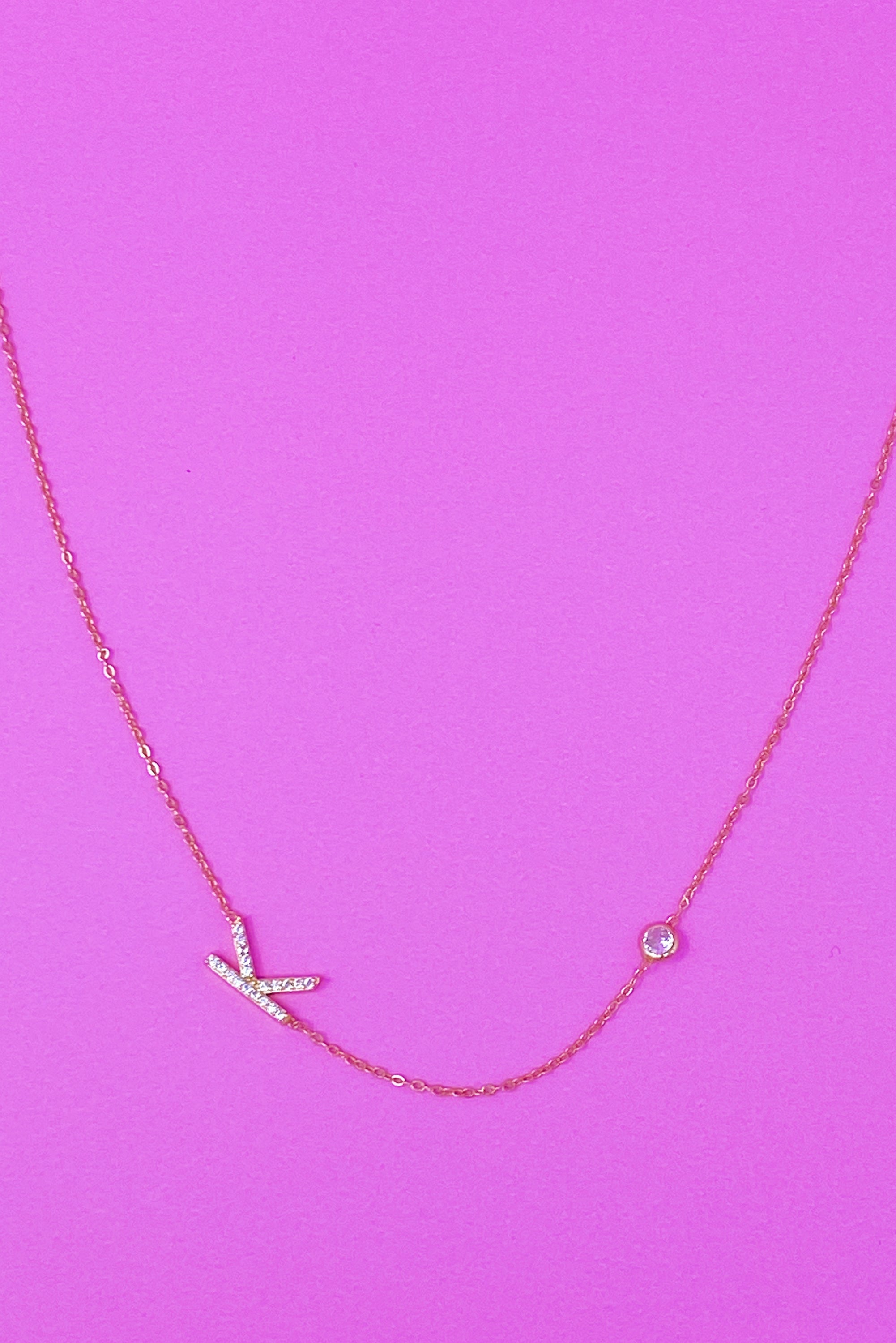 Finest Shine Initial Sterling Silver Necklace featuring a dainty chain, side hanging initial charm, and small cubic zirconia for added sparkle.