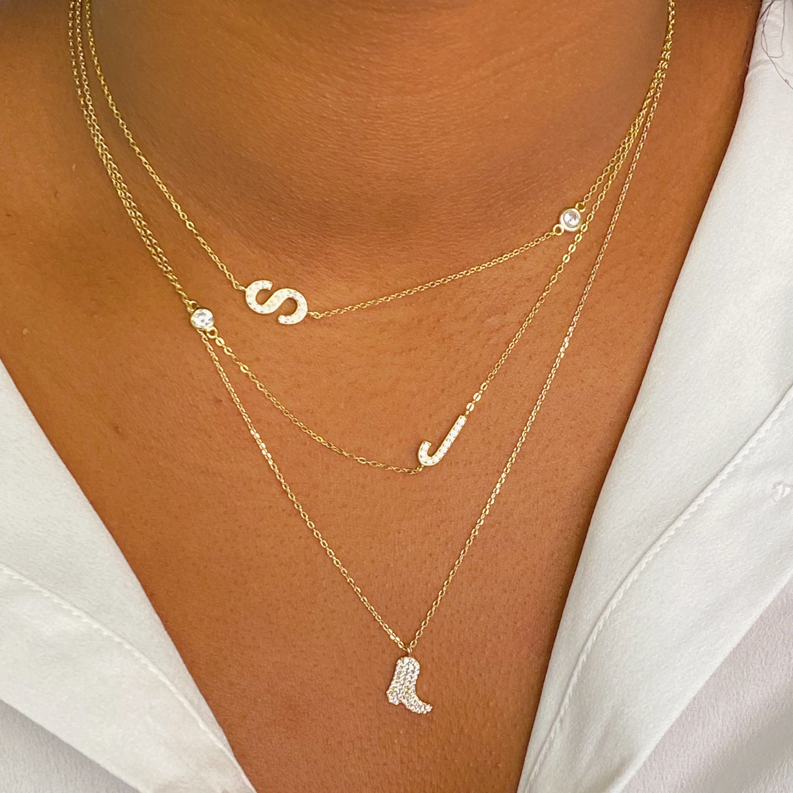 Finest Shine Initial Sterling Silver Necklace featuring a dainty chain, side hanging initial charm, and small cubic zirconia for added sparkle.