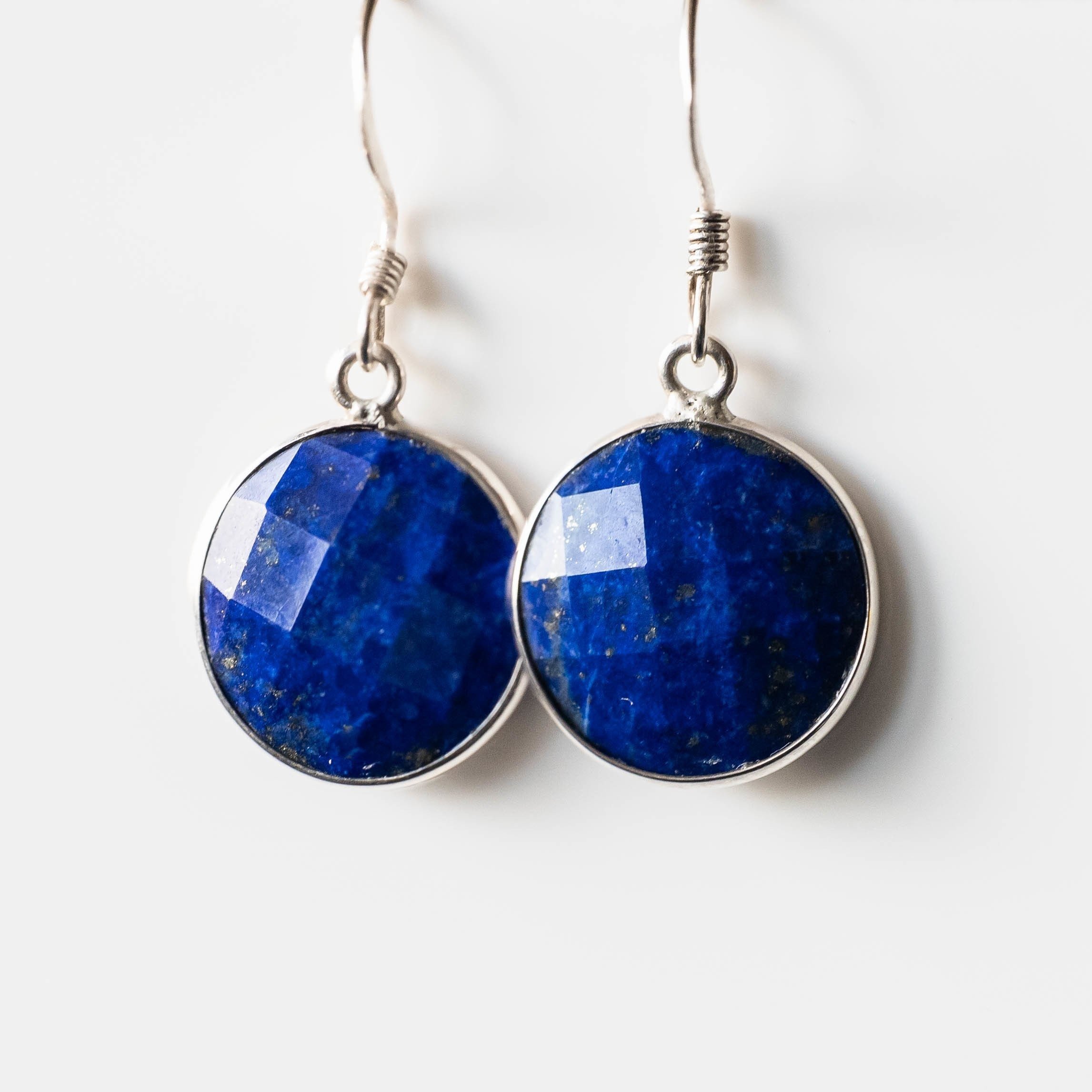 Fiorela Lapis Lazuli Round Drop Earrings in sterling silver, featuring 14 mm blue lapis lazuli stones and anti-tarnish ear wires.