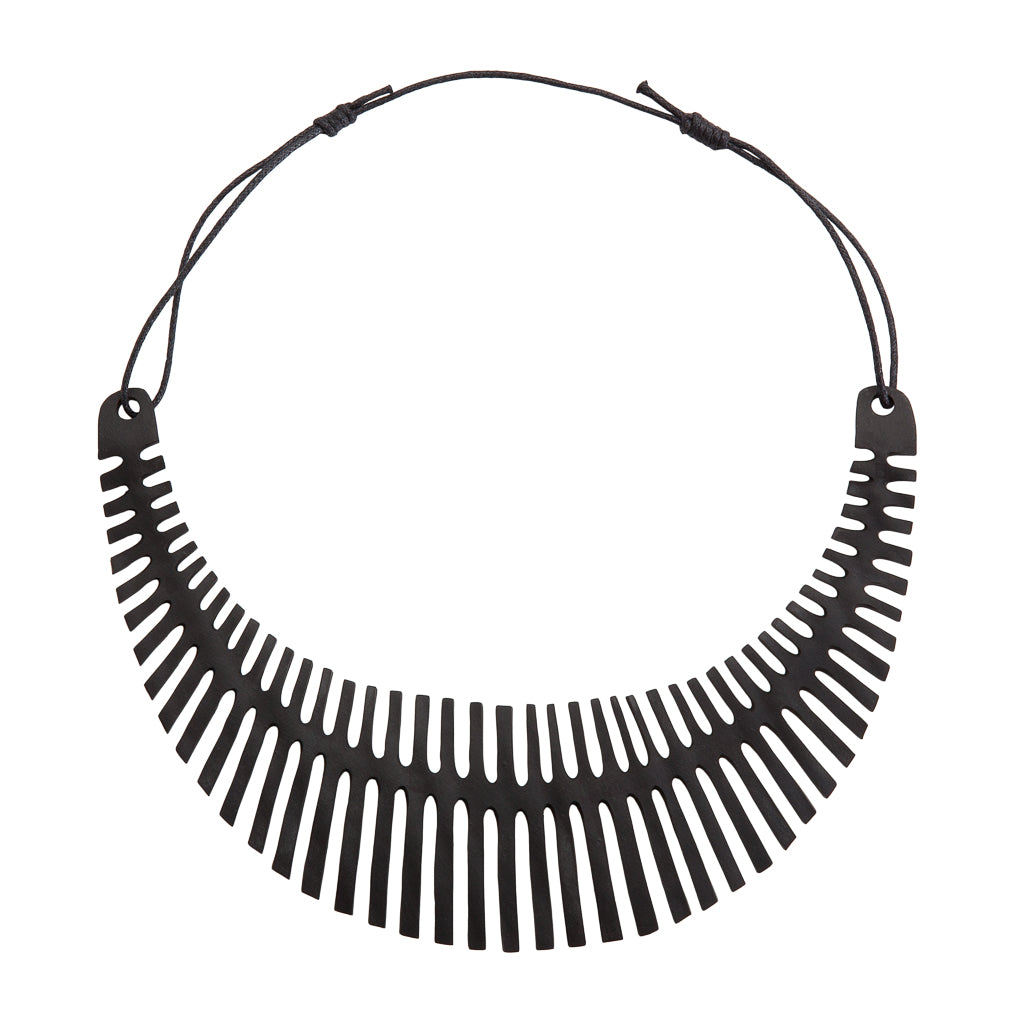 Fishbone Inner Tube Necklace made from reclaimed rubber, featuring a playful design and lightweight construction, ideal for eco-conscious fashion.