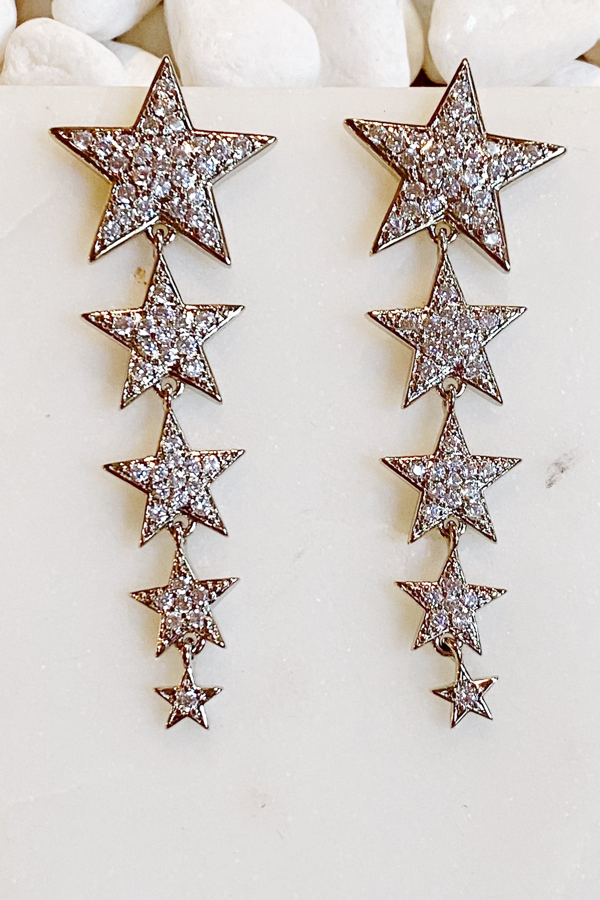 Five Stars Dangle Down Earrings featuring five sparkling stars with cubic zirconia, rhodium plated brass, elegant and fun design.