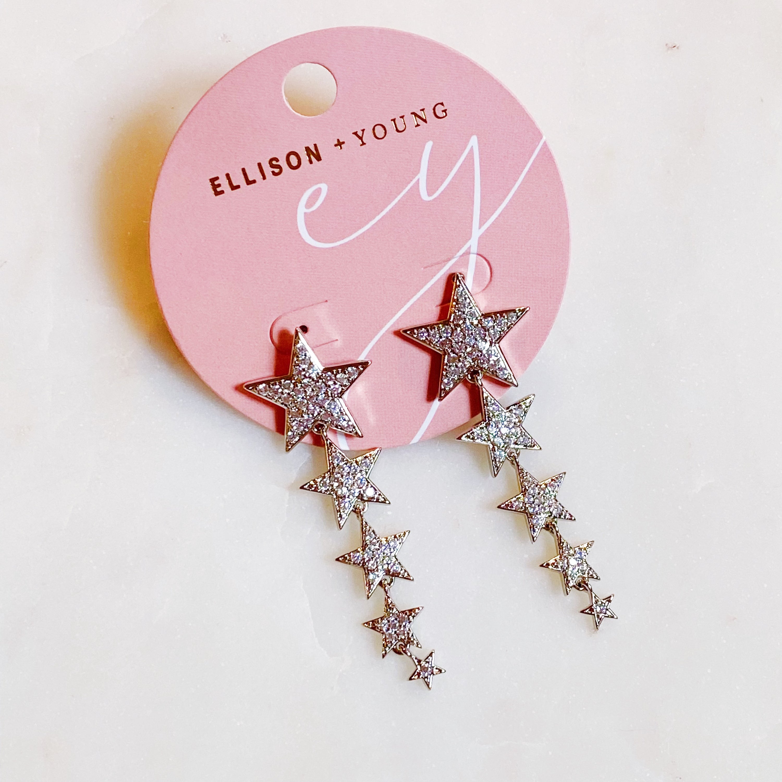 Five Stars Dangle Down Earrings featuring five sparkling stars with cubic zirconia, rhodium plated brass, elegant and fun design.