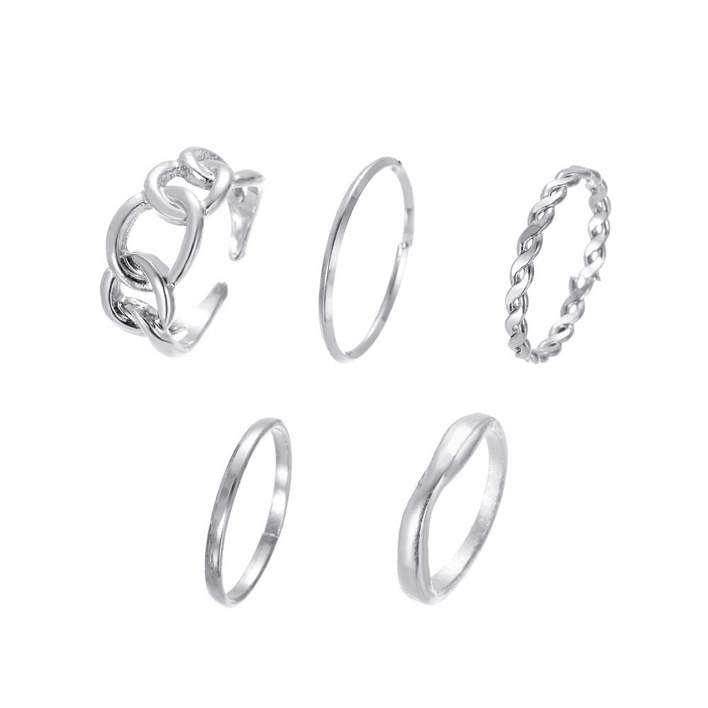 Five-Piece Ring Set featuring unique designs made from durable alloy, showcasing various sizes and styles for versatile wear.