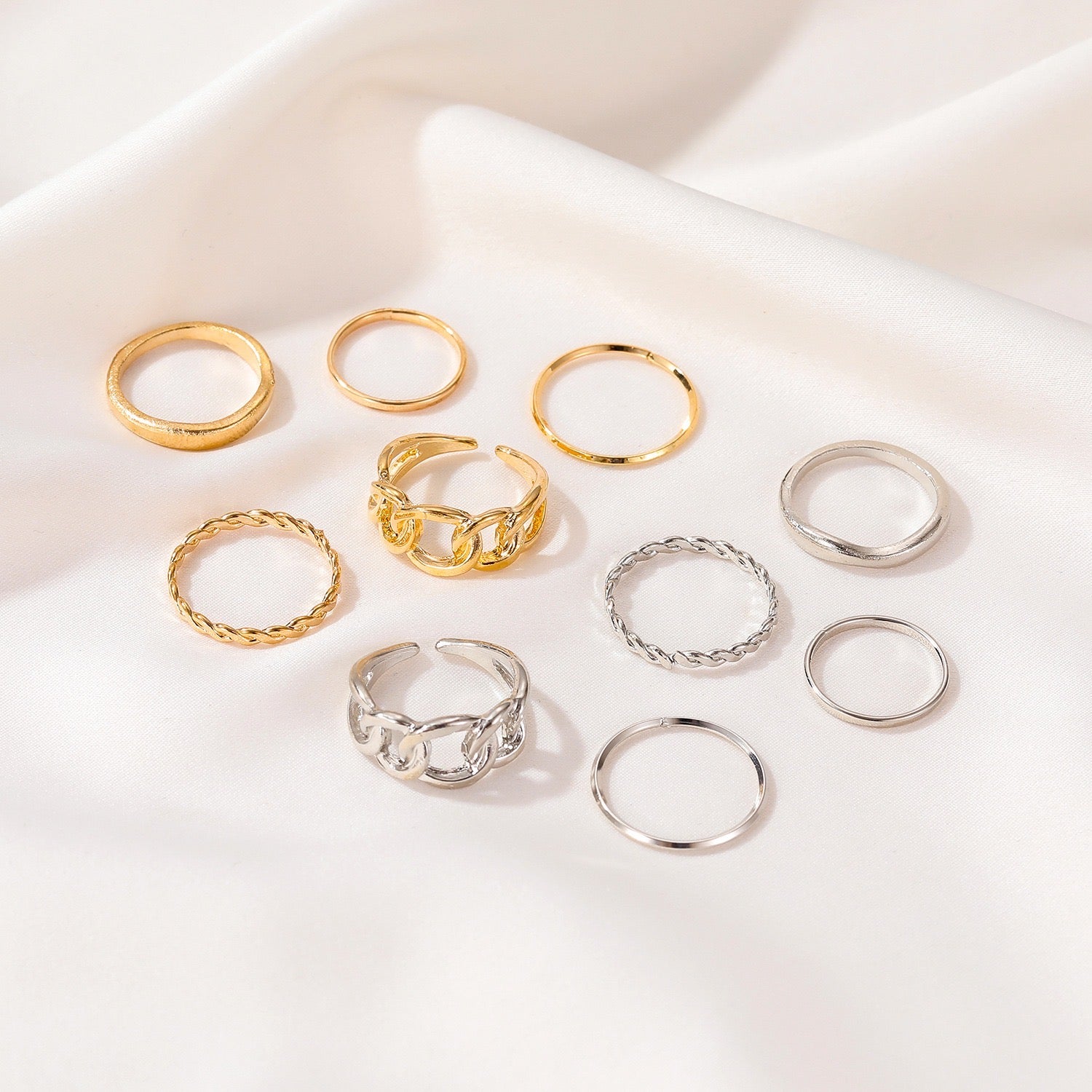 Five-Piece Ring Set featuring unique designs made from durable alloy, showcasing various sizes and styles for versatile wear.